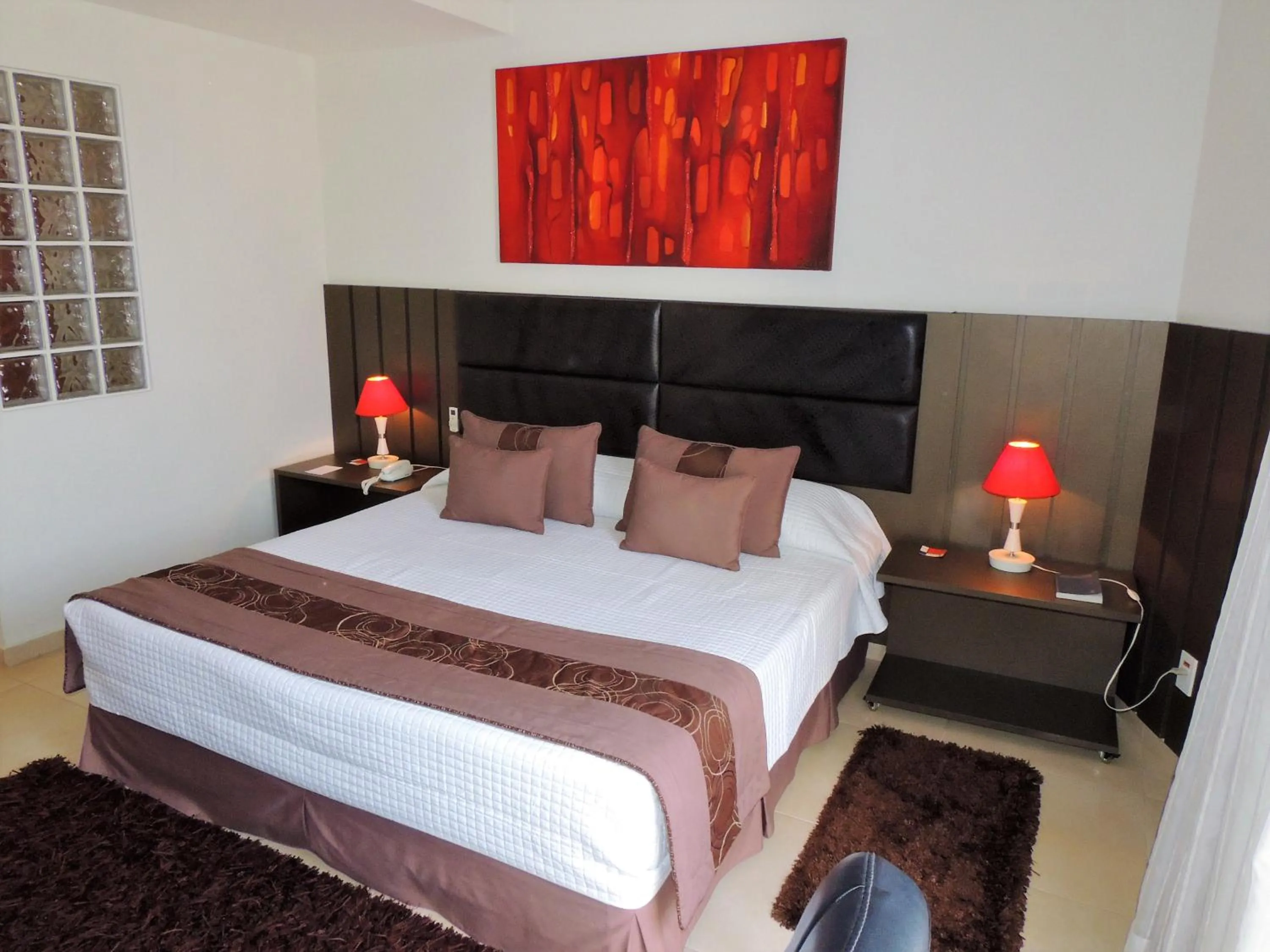 Bed in Mondrian Suite Hotel