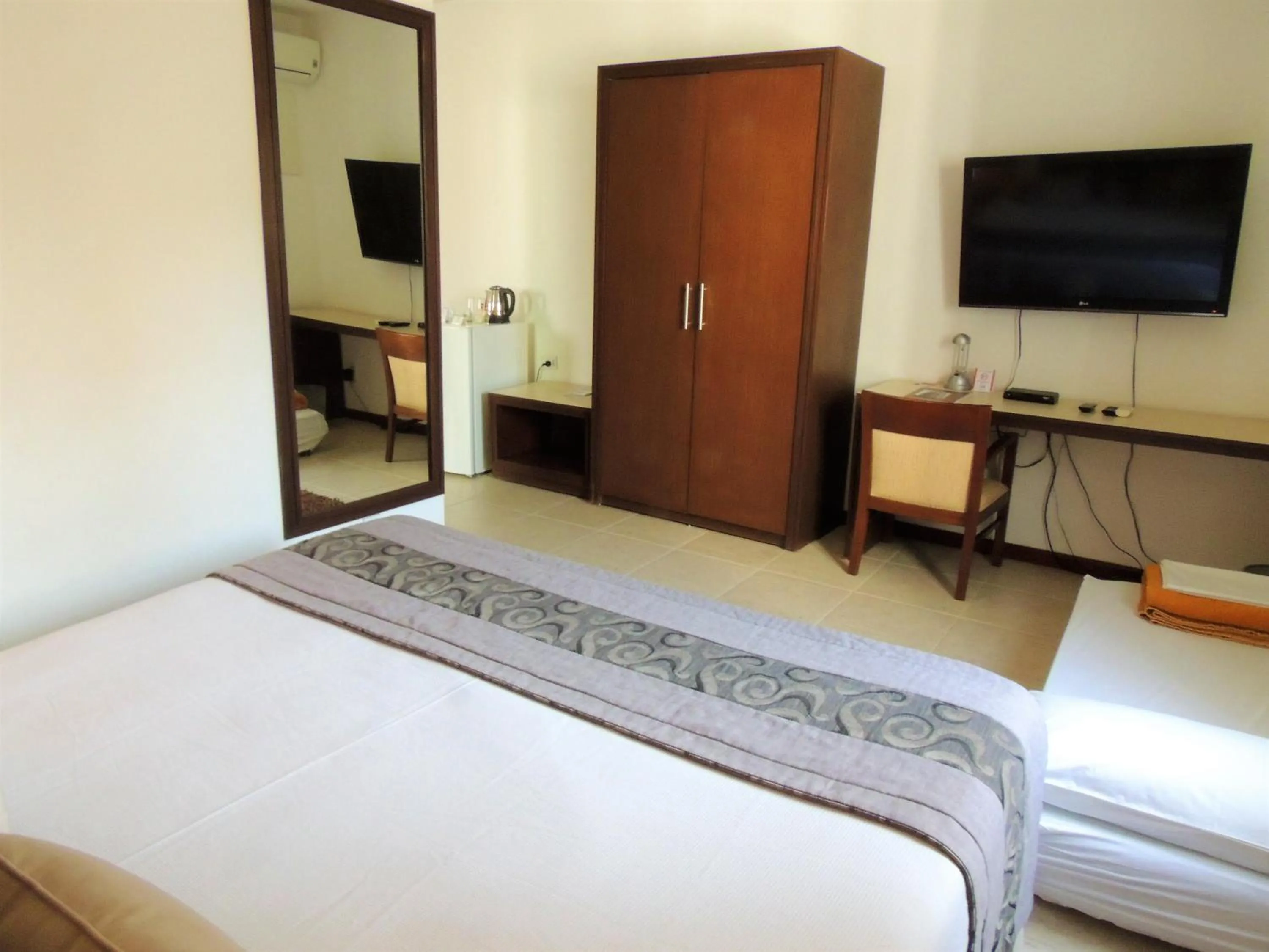 Bed in Mondrian Suite Hotel