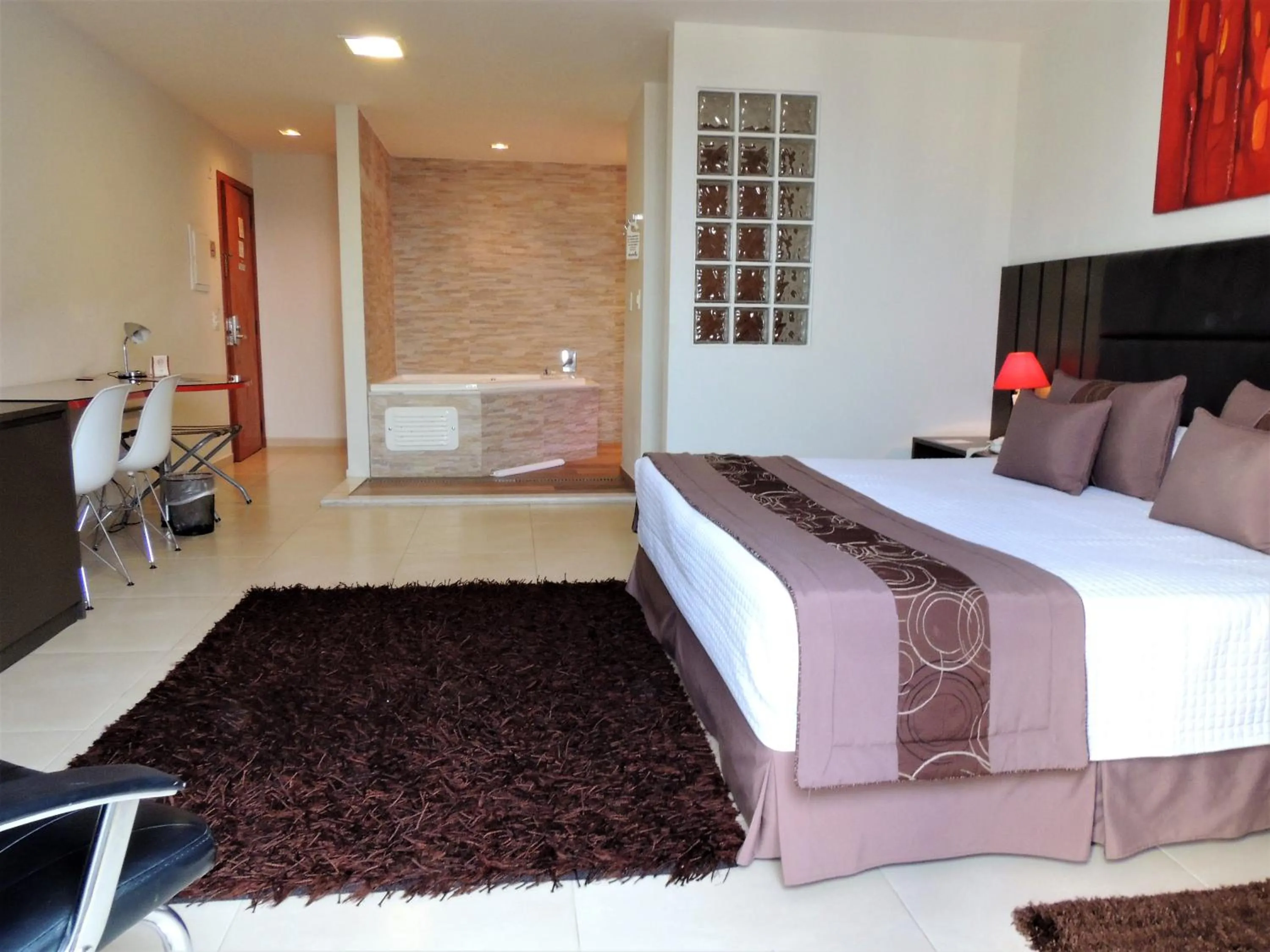 Bed in Mondrian Suite Hotel