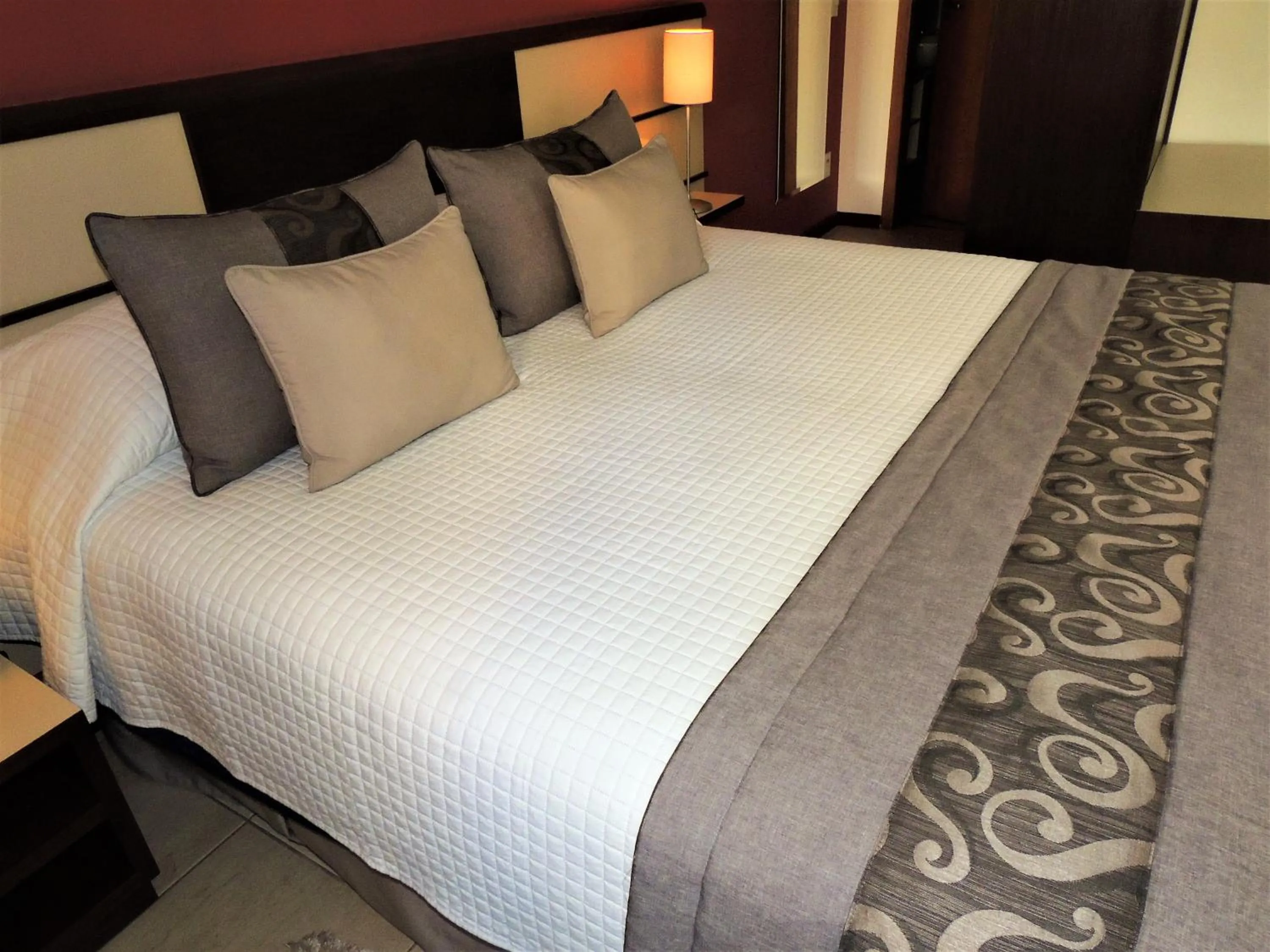 Bed in Mondrian Suite Hotel