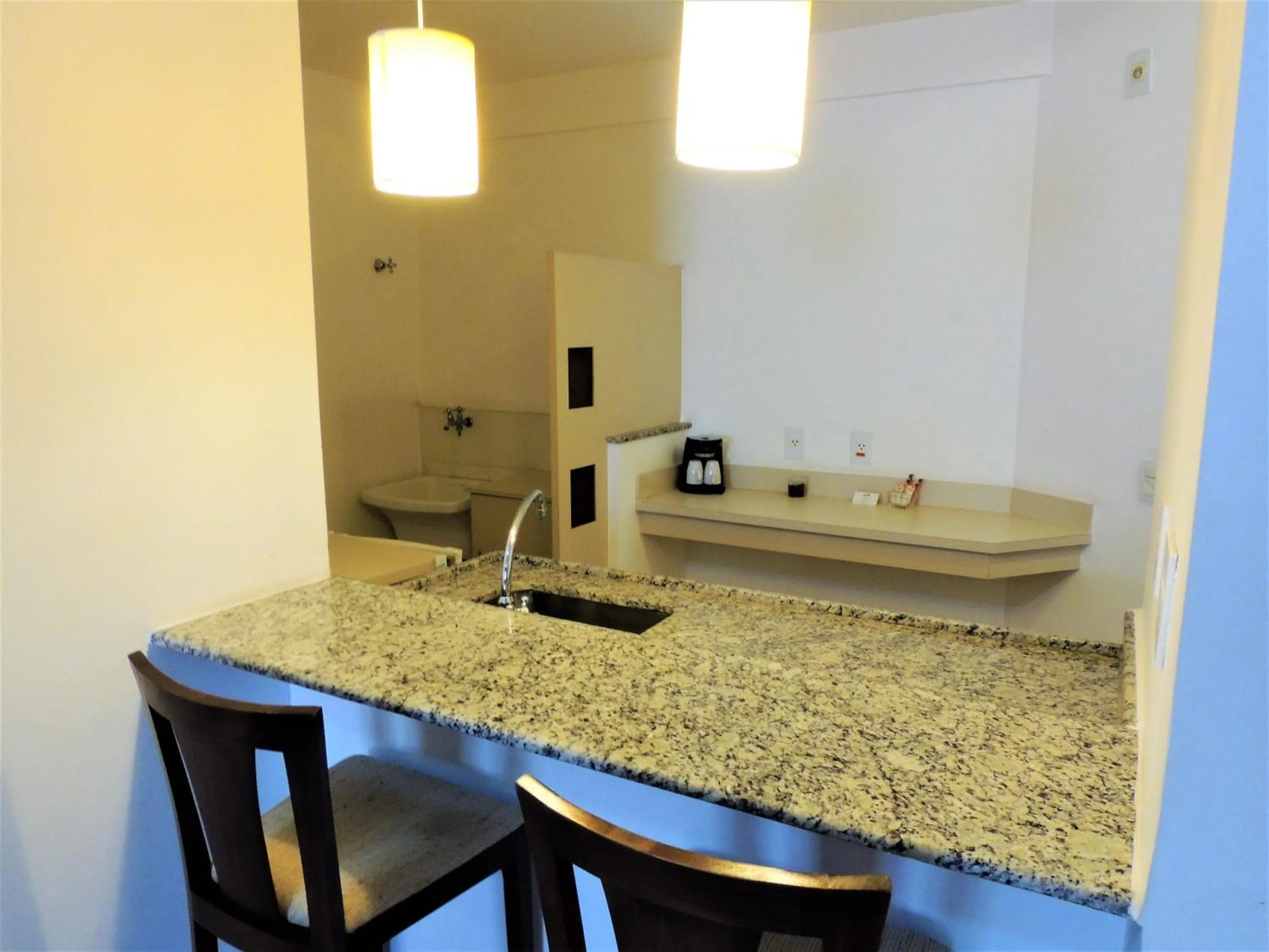 Kitchen or kitchenette in Mondrian Suite Hotel