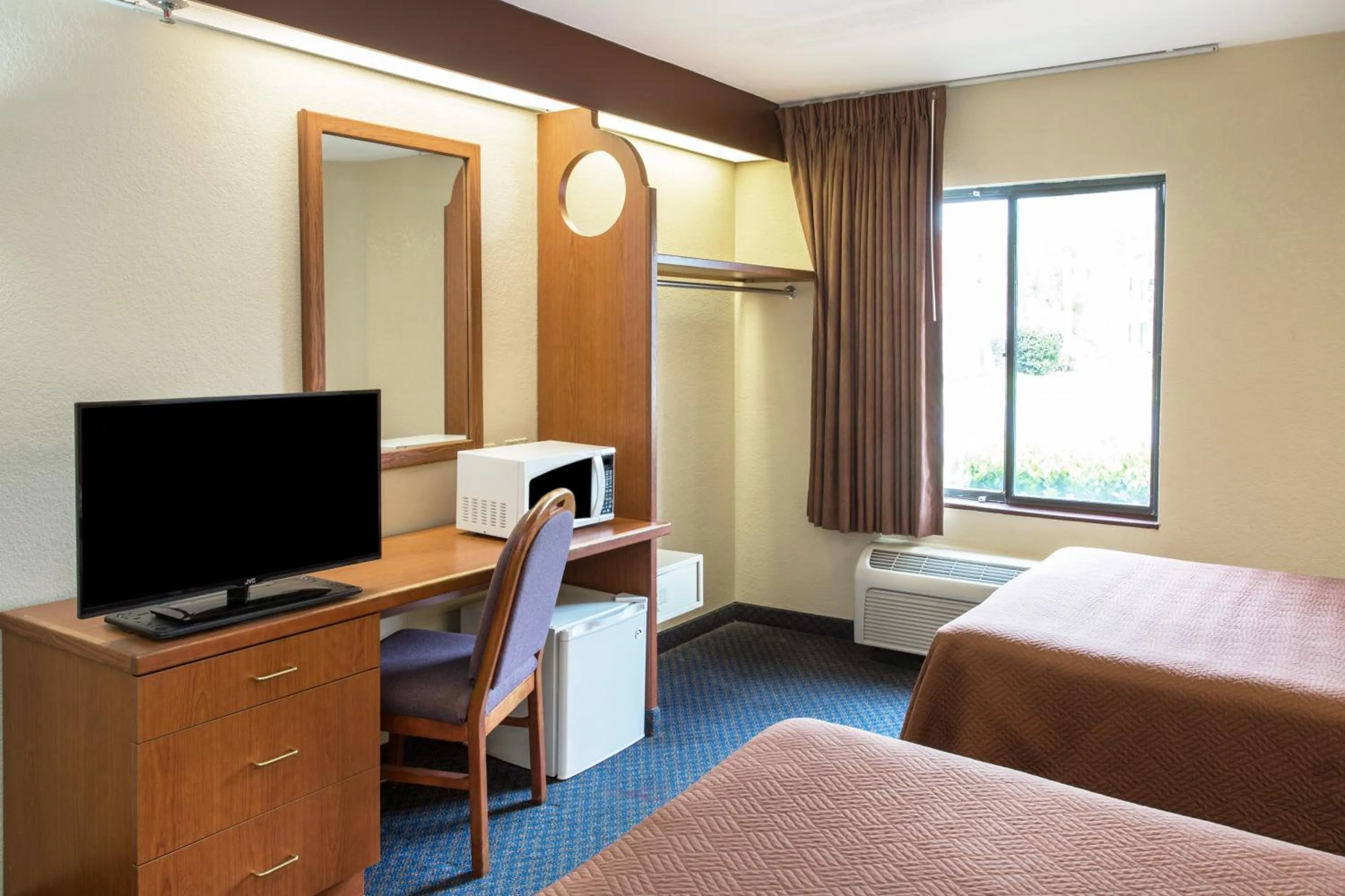 Guests, Bed in Travelodge by Wyndham Fort Myers Airport