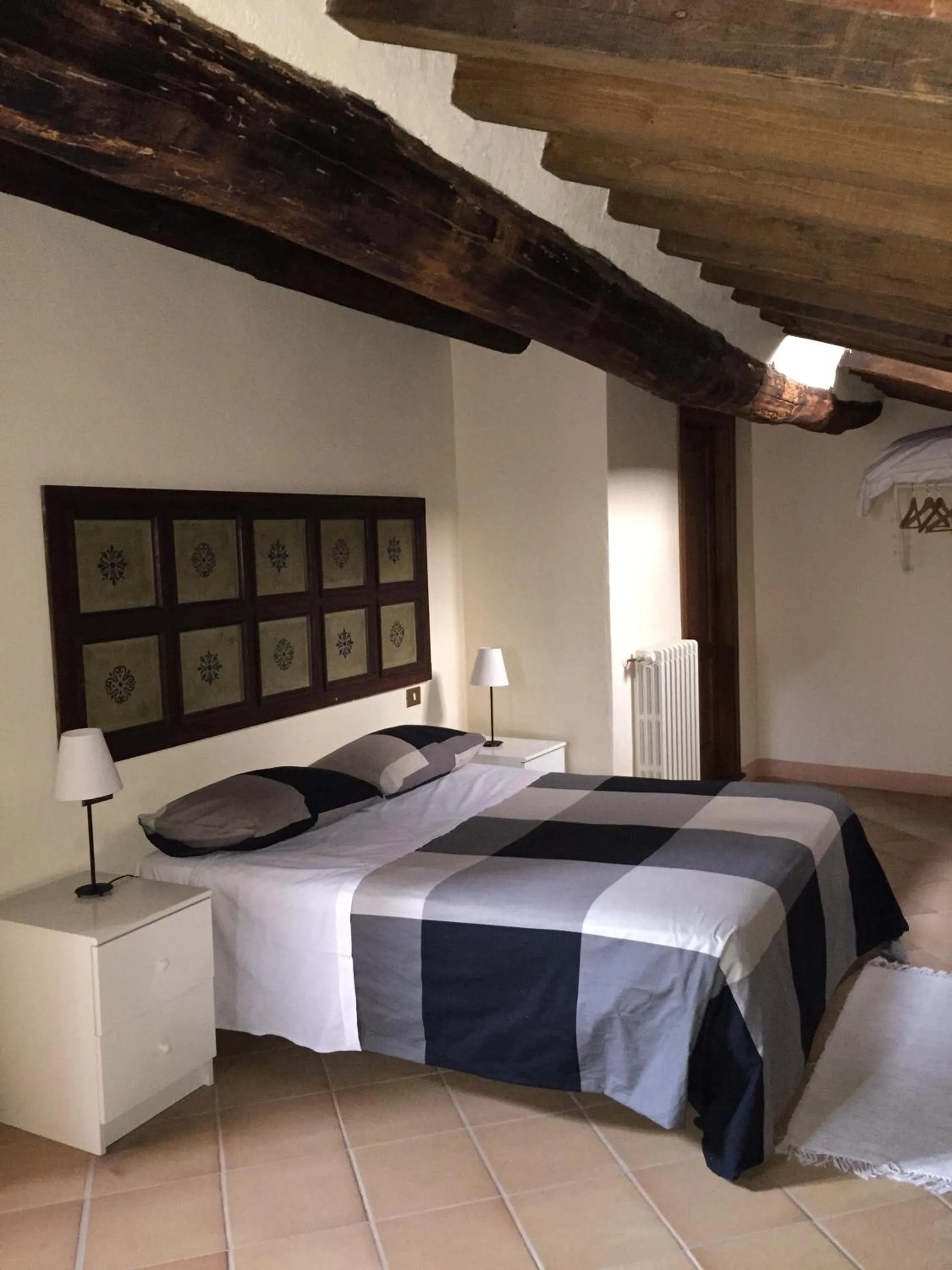 Photo of the whole room, Bed in Locanda Petrella