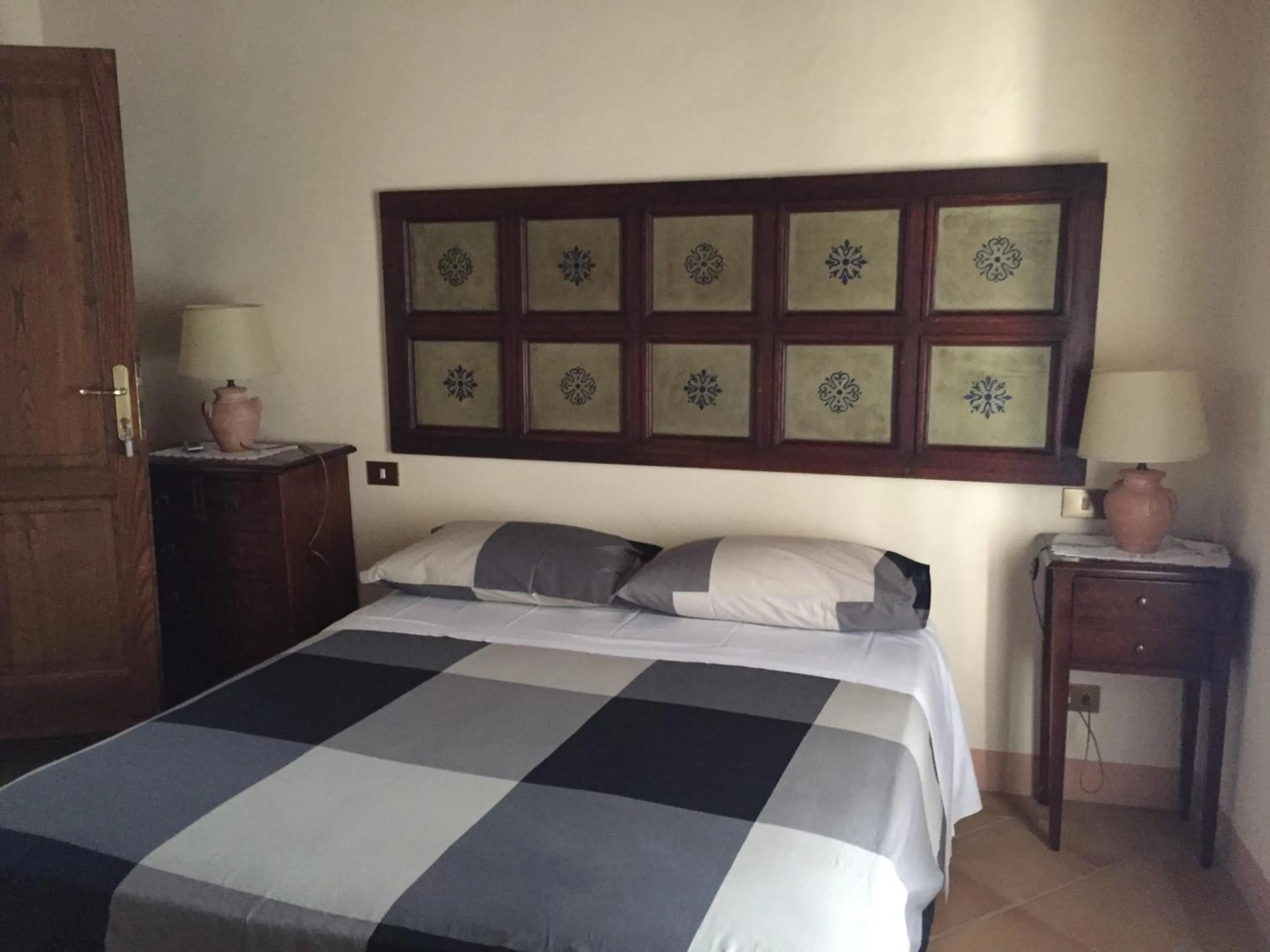 Photo of the whole room, Bed in Locanda Petrella