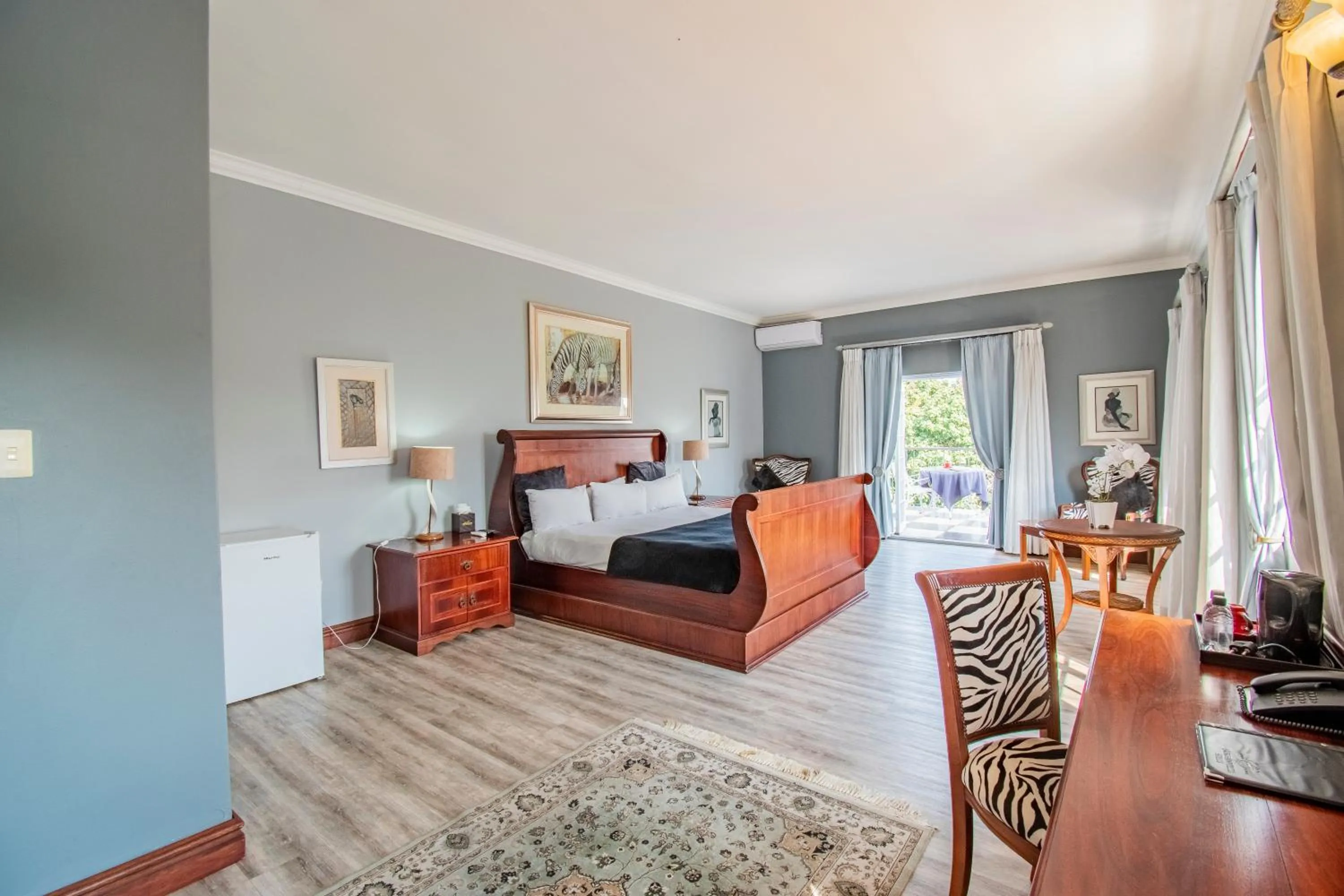 Bed in Emakhosini Boutique Hotel