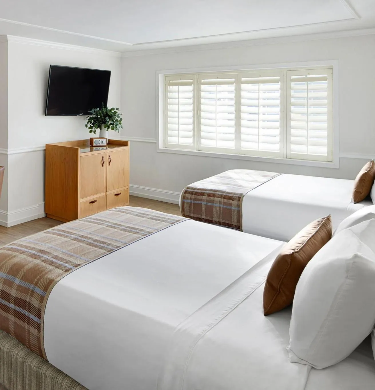 Bed in Coachman's Inn, A Four Sisters Inn