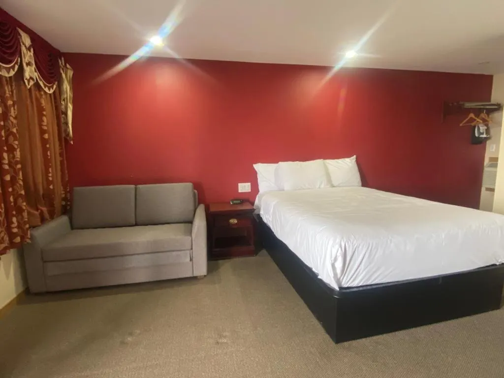 Bed in Masterson's Motel