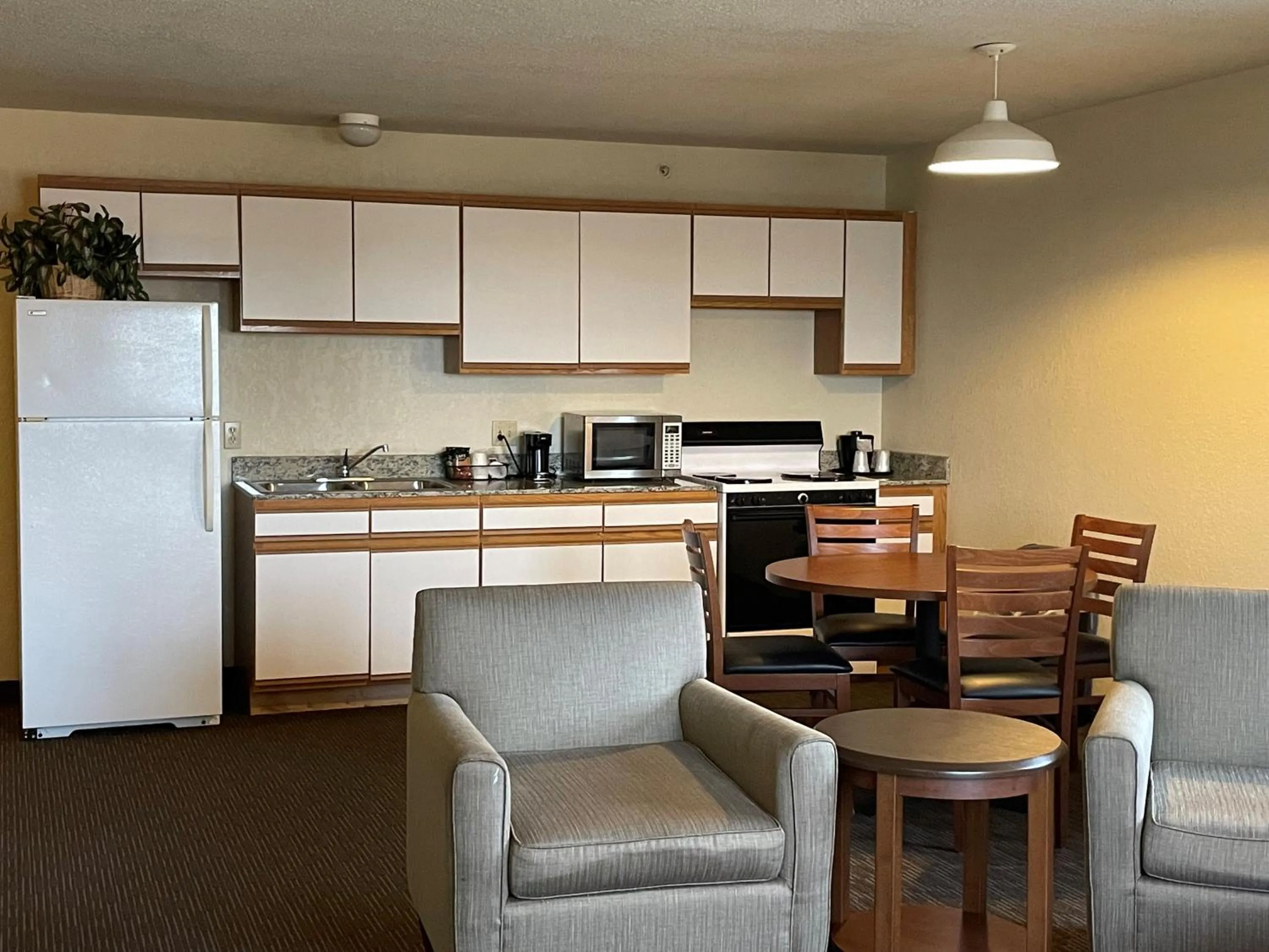 kitchen in AmericInn by Wyndham Petoskey