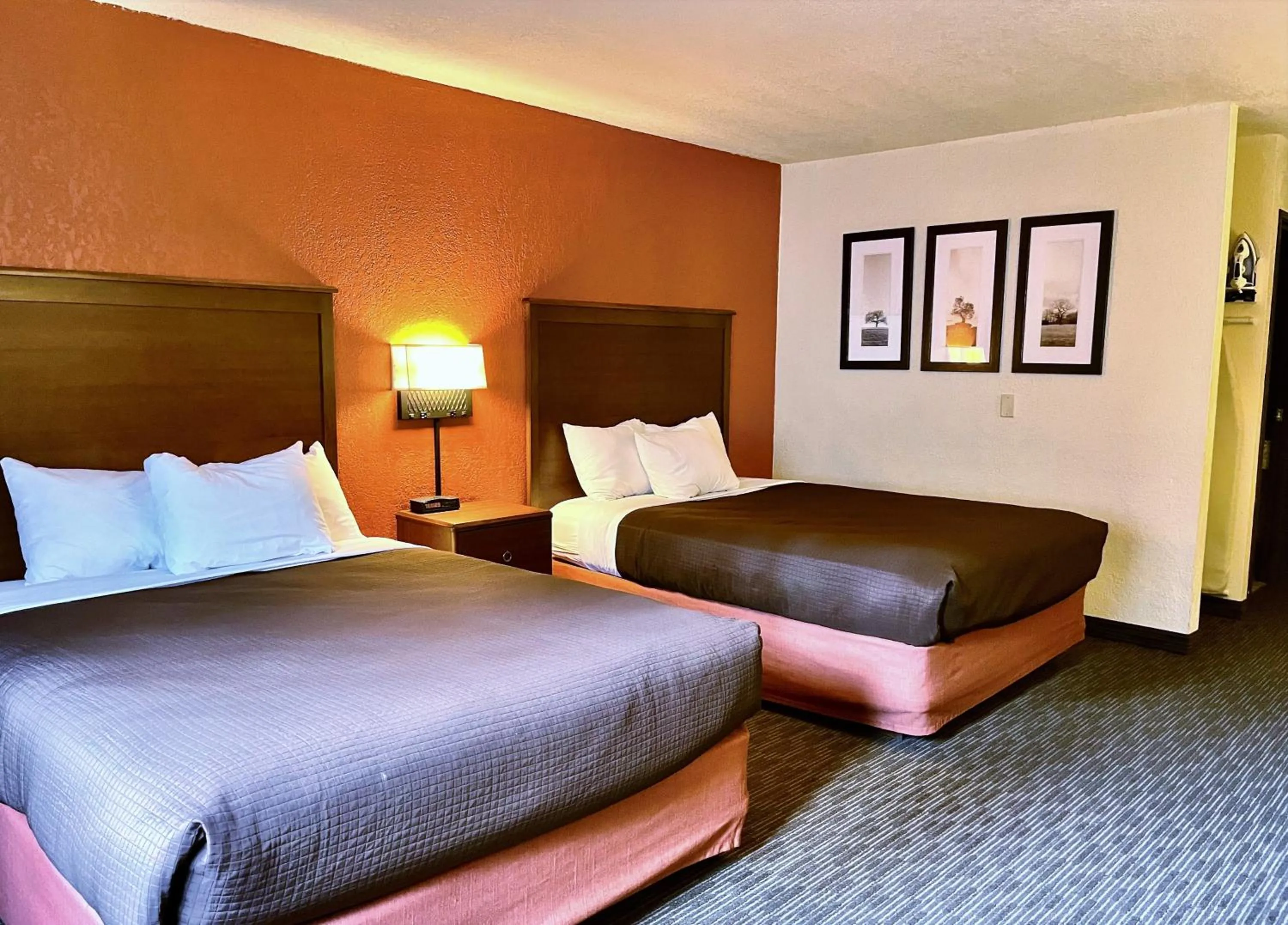 Bed in AmericInn by Wyndham Petoskey