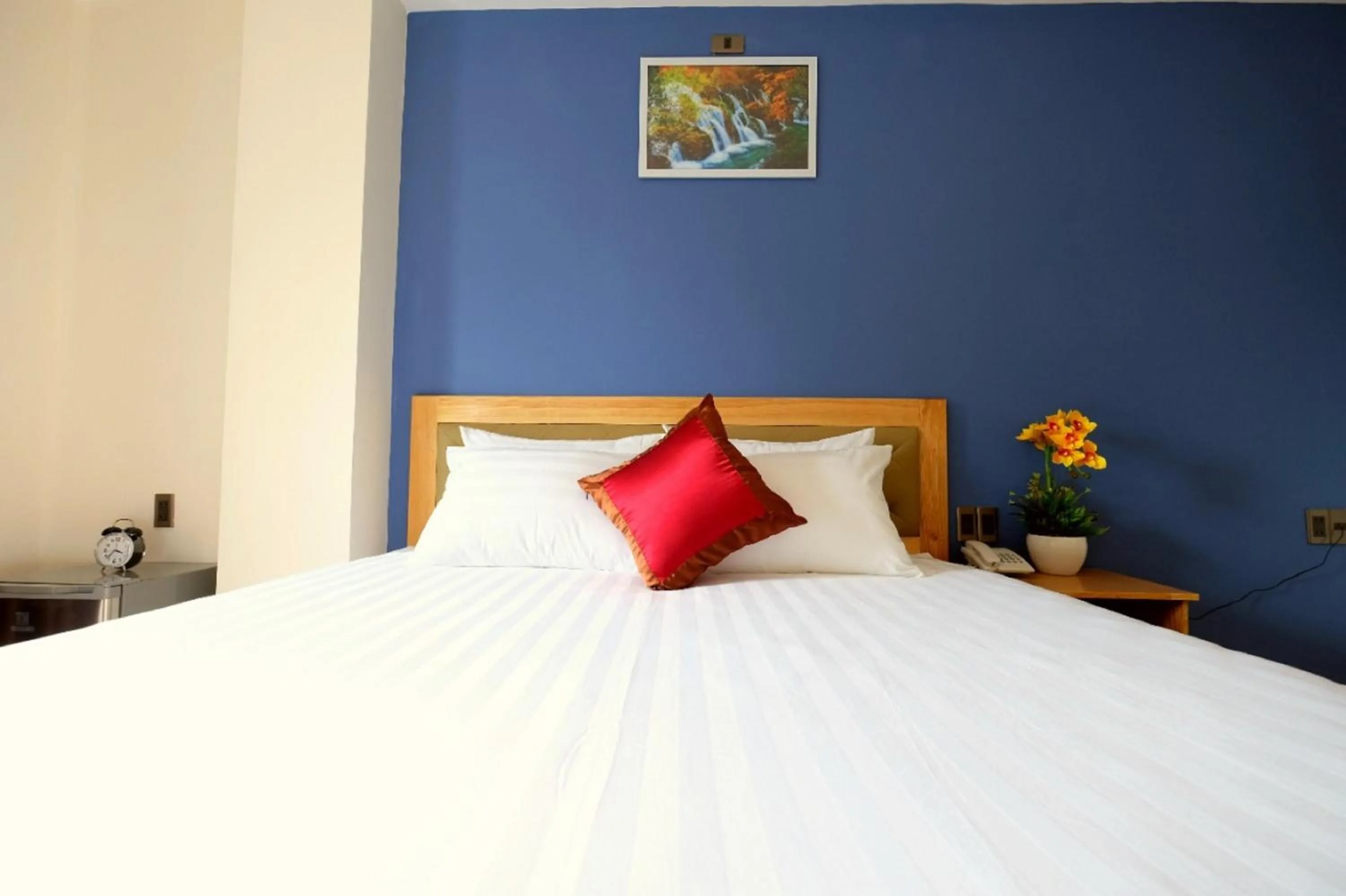 Bed in Marigold Hotel & Apartment