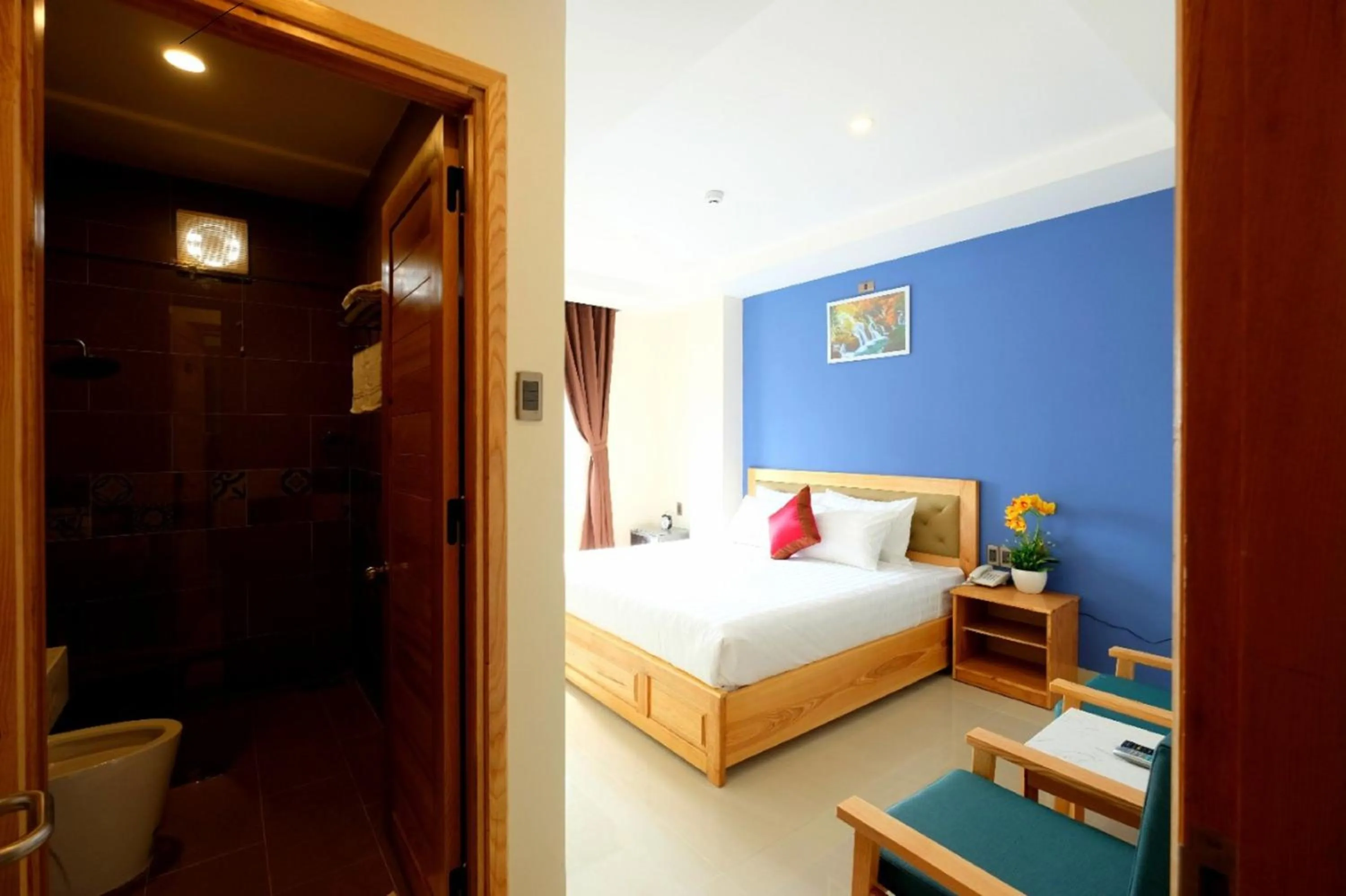 Photo of the whole room, Bed in Marigold Hotel & Apartment