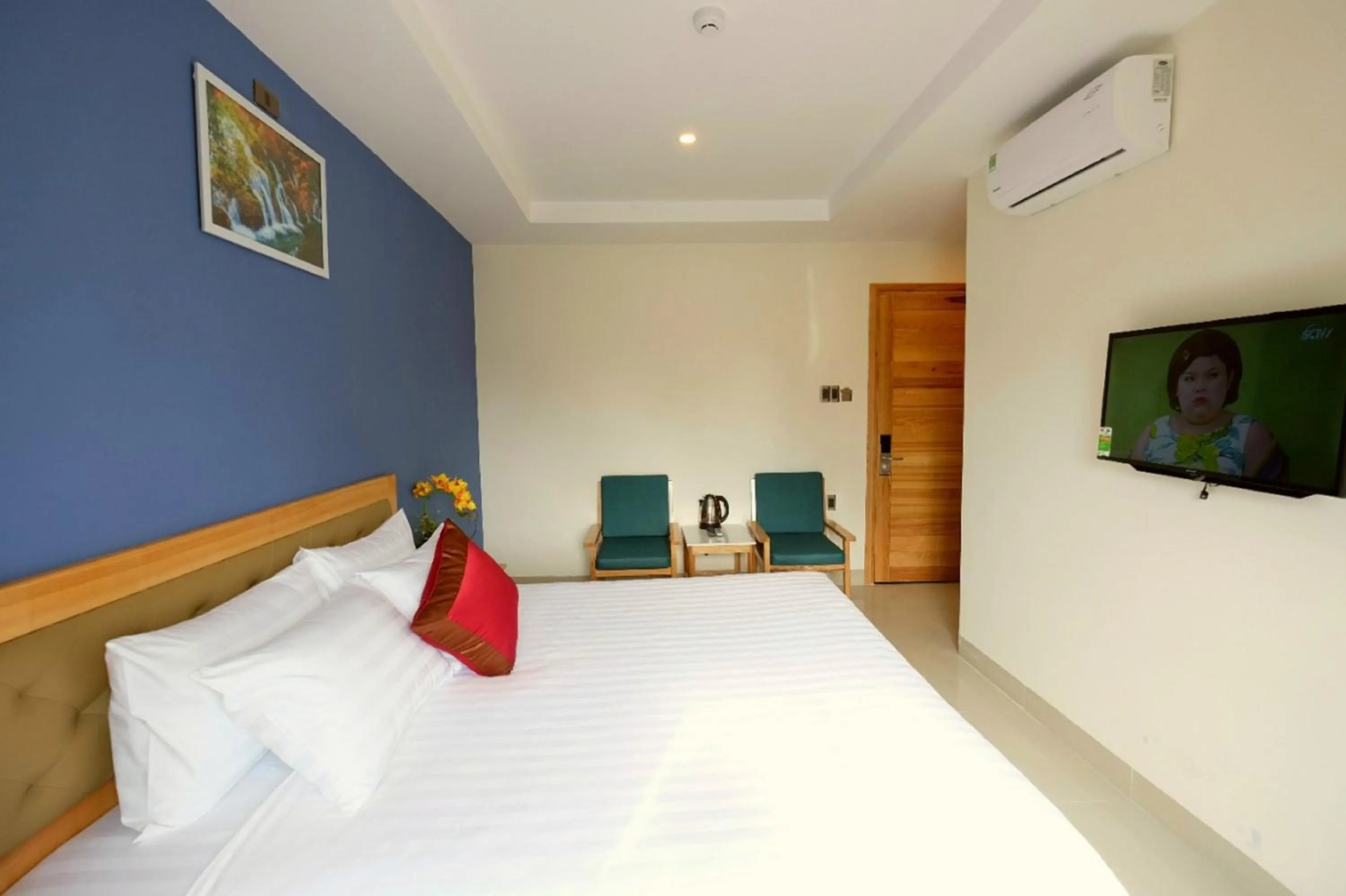 Bed in Marigold Hotel & Apartment