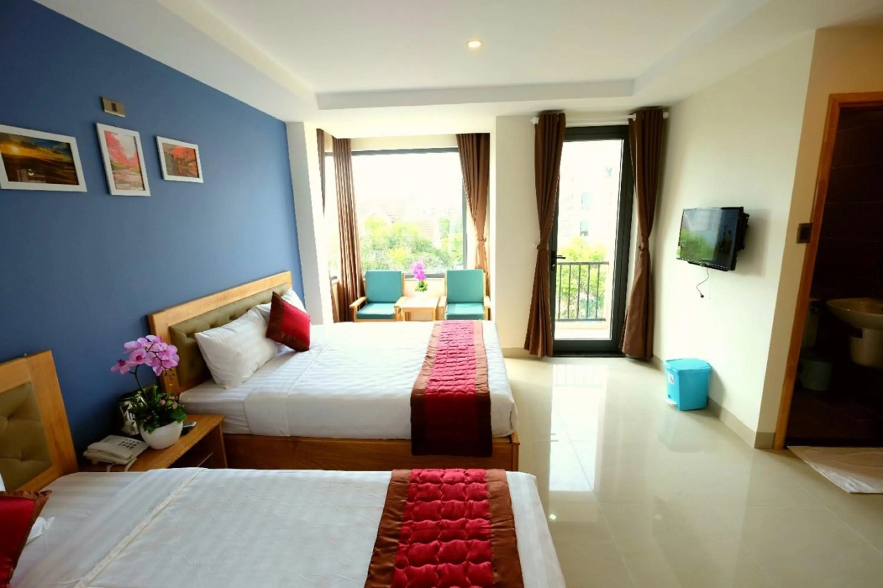 Bed in Marigold Hotel & Apartment