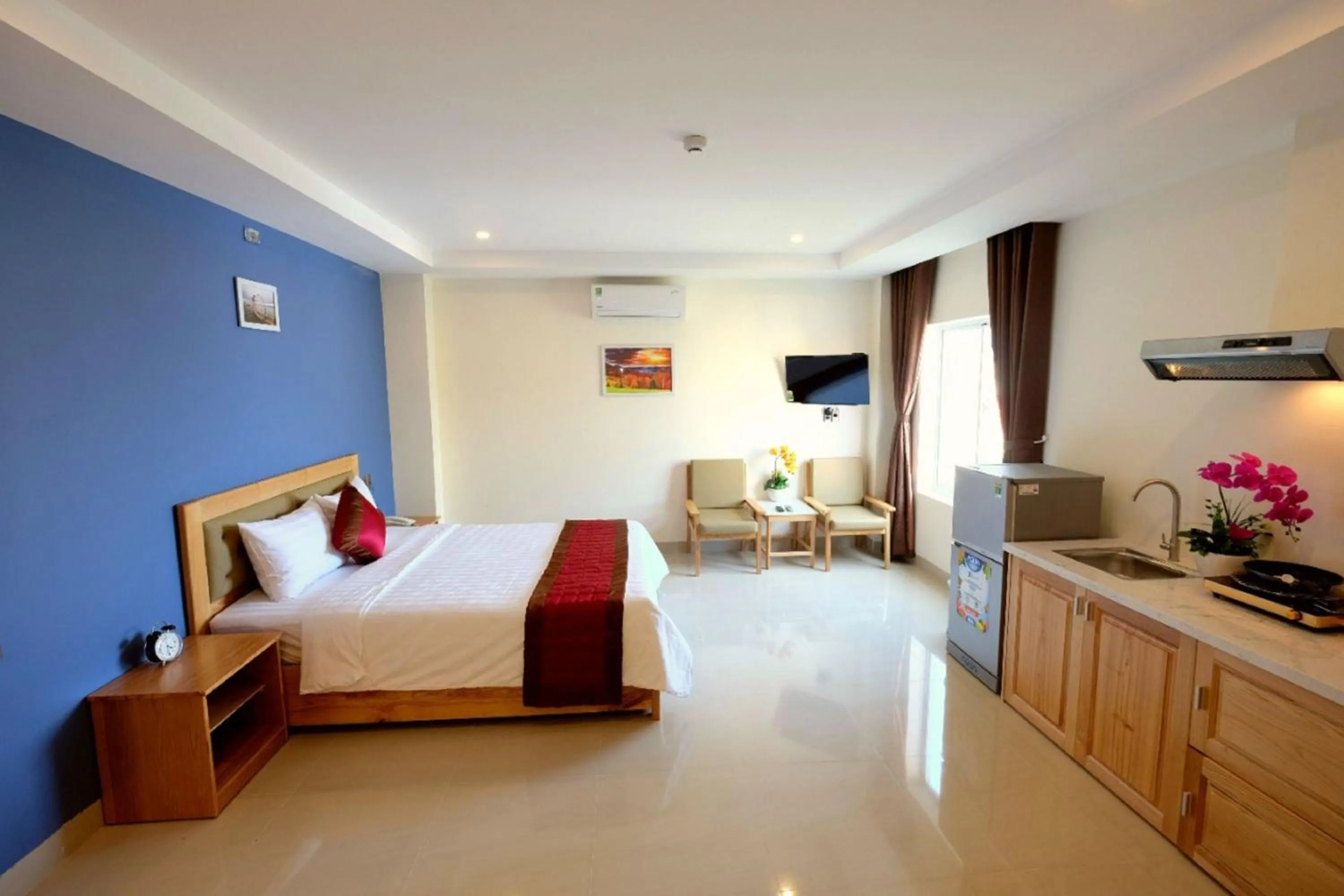 Photo of the whole room, Bed in Marigold Hotel & Apartment