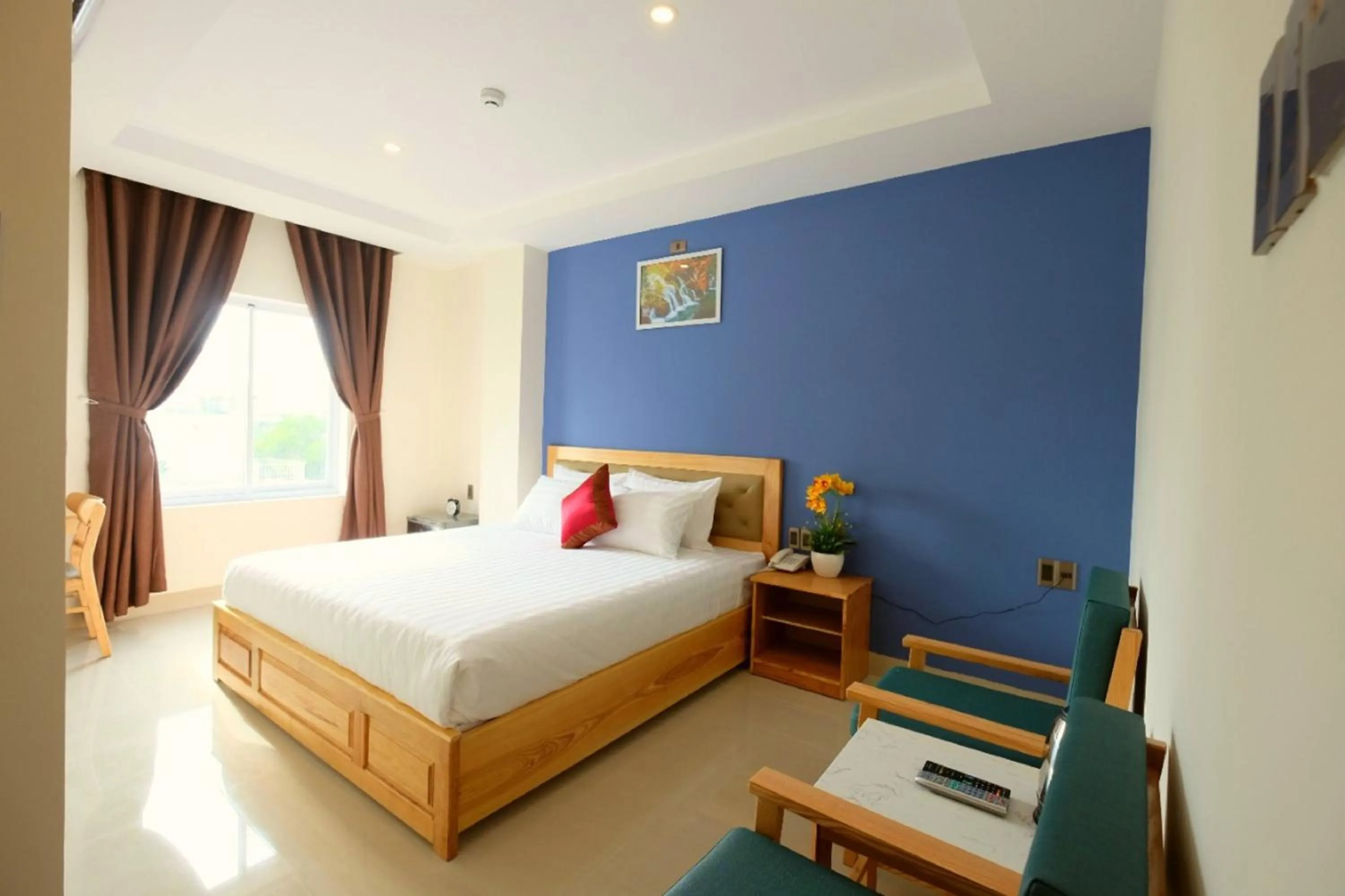 Photo of the whole room, Bed in Marigold Hotel & Apartment