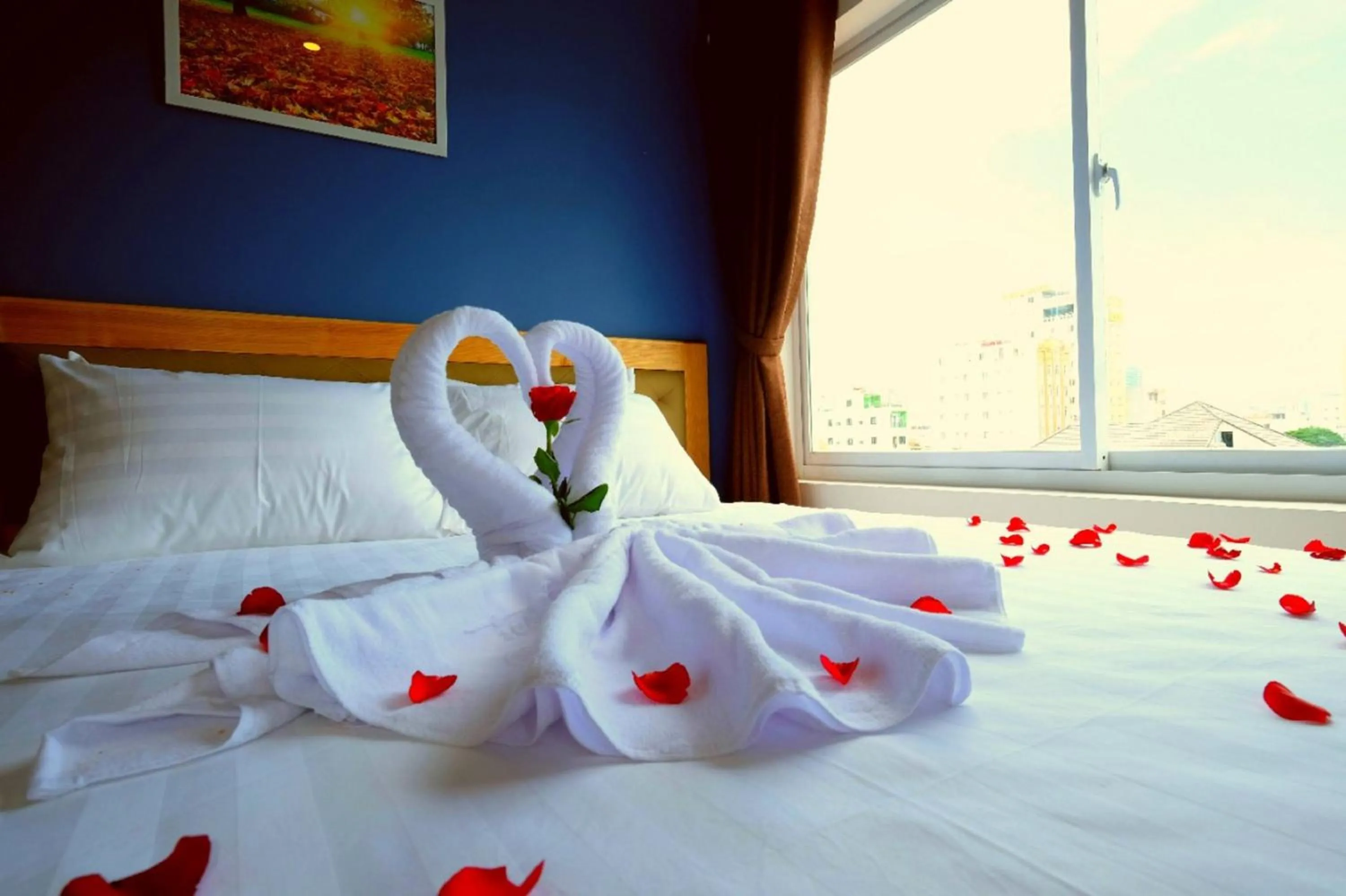 Bed in Marigold Hotel & Apartment