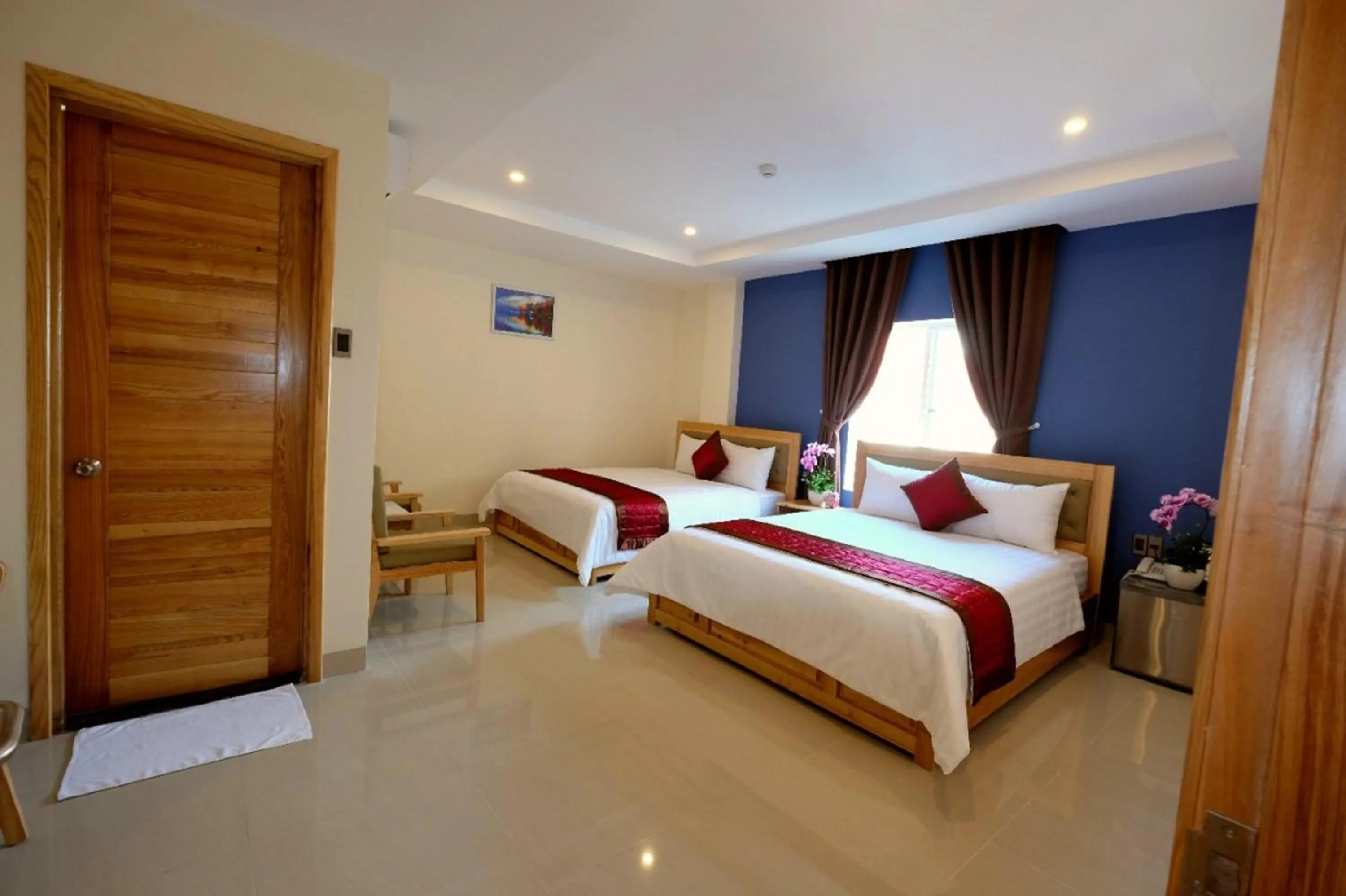 Bed in Marigold Hotel & Apartment