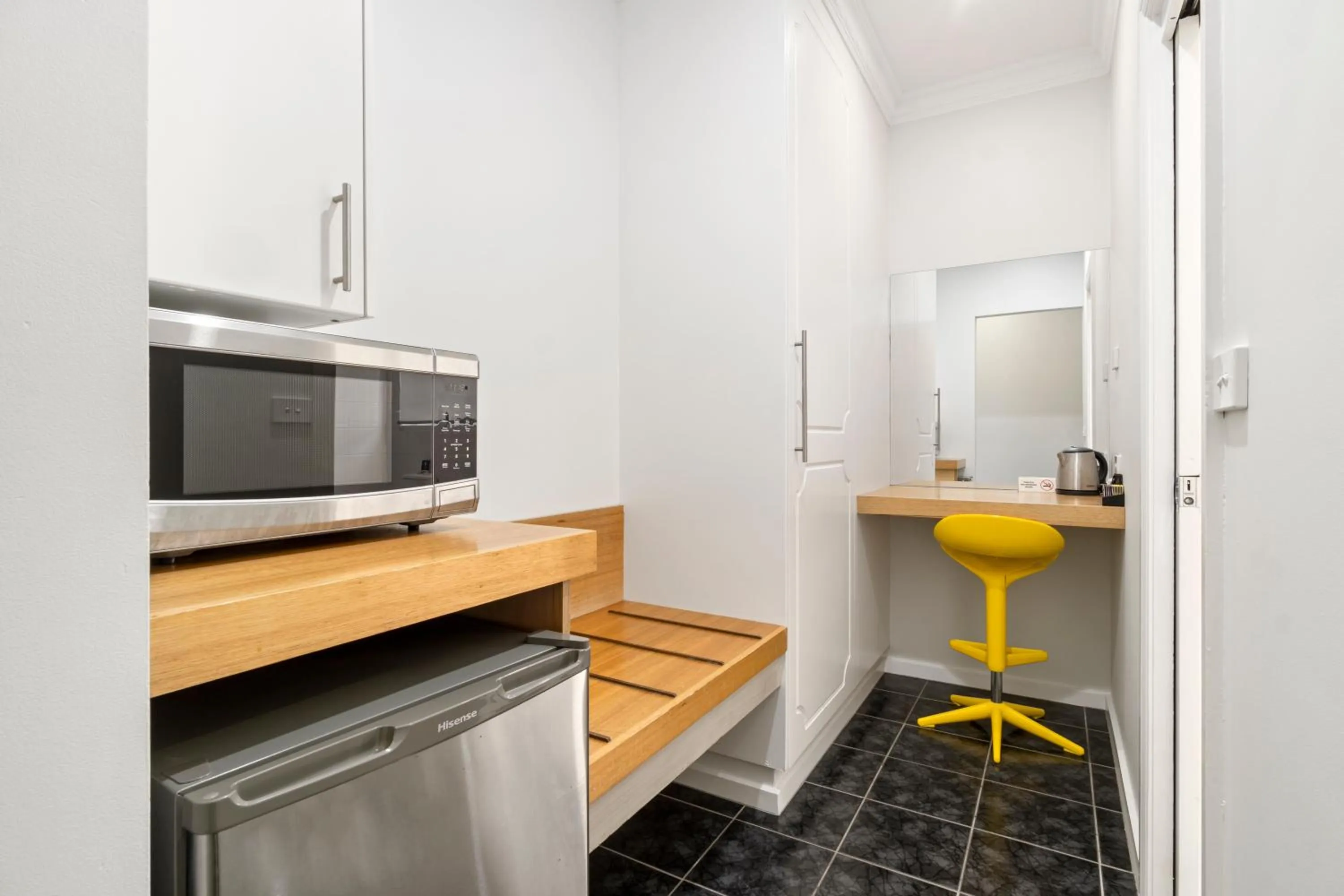 Kitchen or kitchenette in The International Motel Apollo Bay