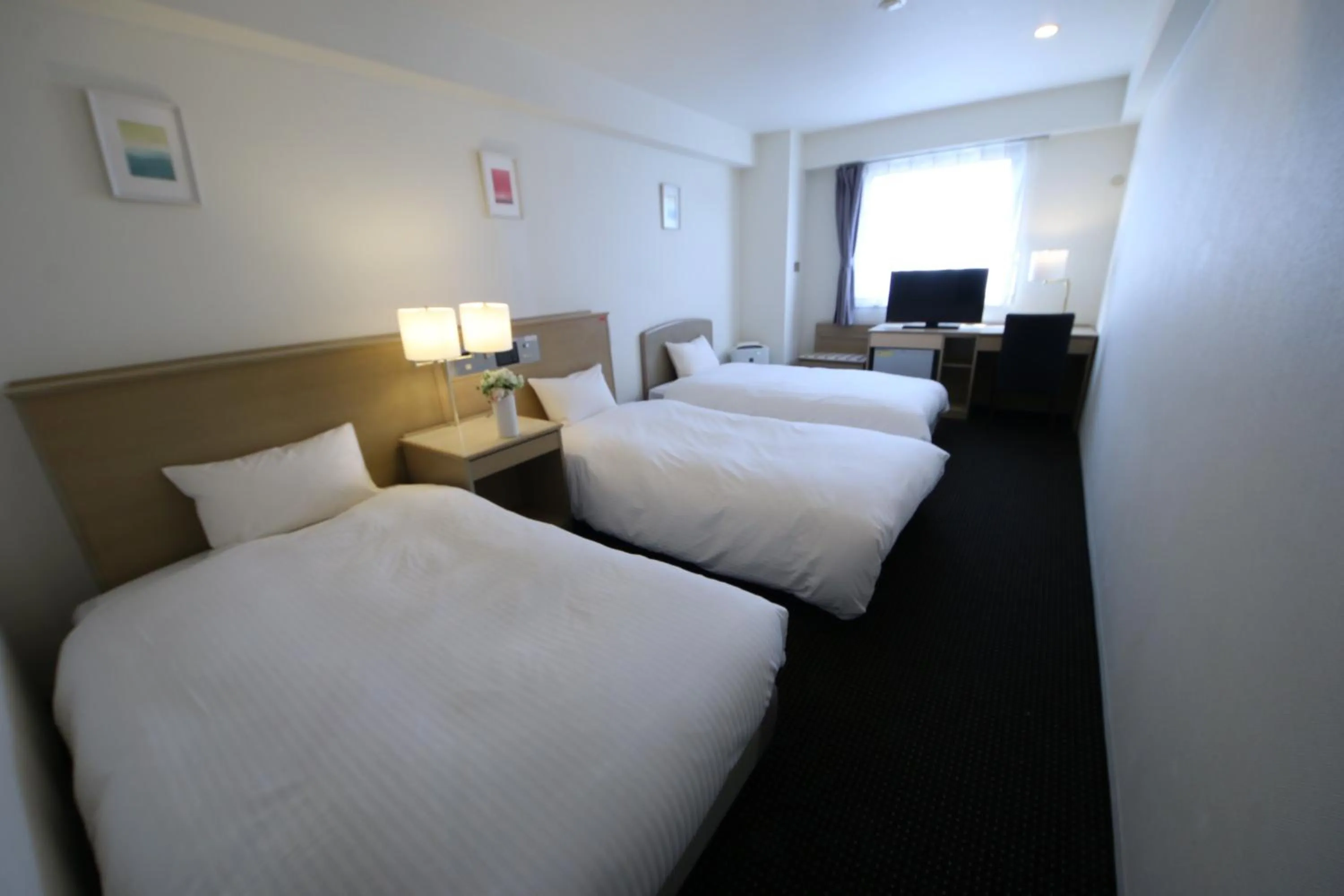 Bed in Grand Park Hotel Panex Chiba