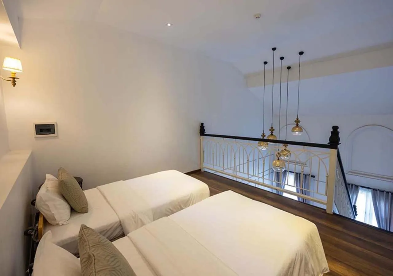 Living room, Bed in Le Thatluang D'oR Boutique Hotel