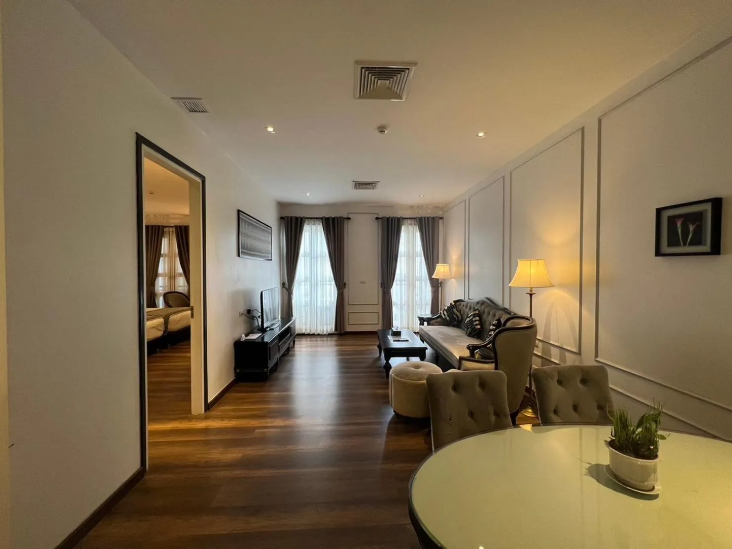 Living room, Bed in Le Thatluang D'oR Boutique Hotel