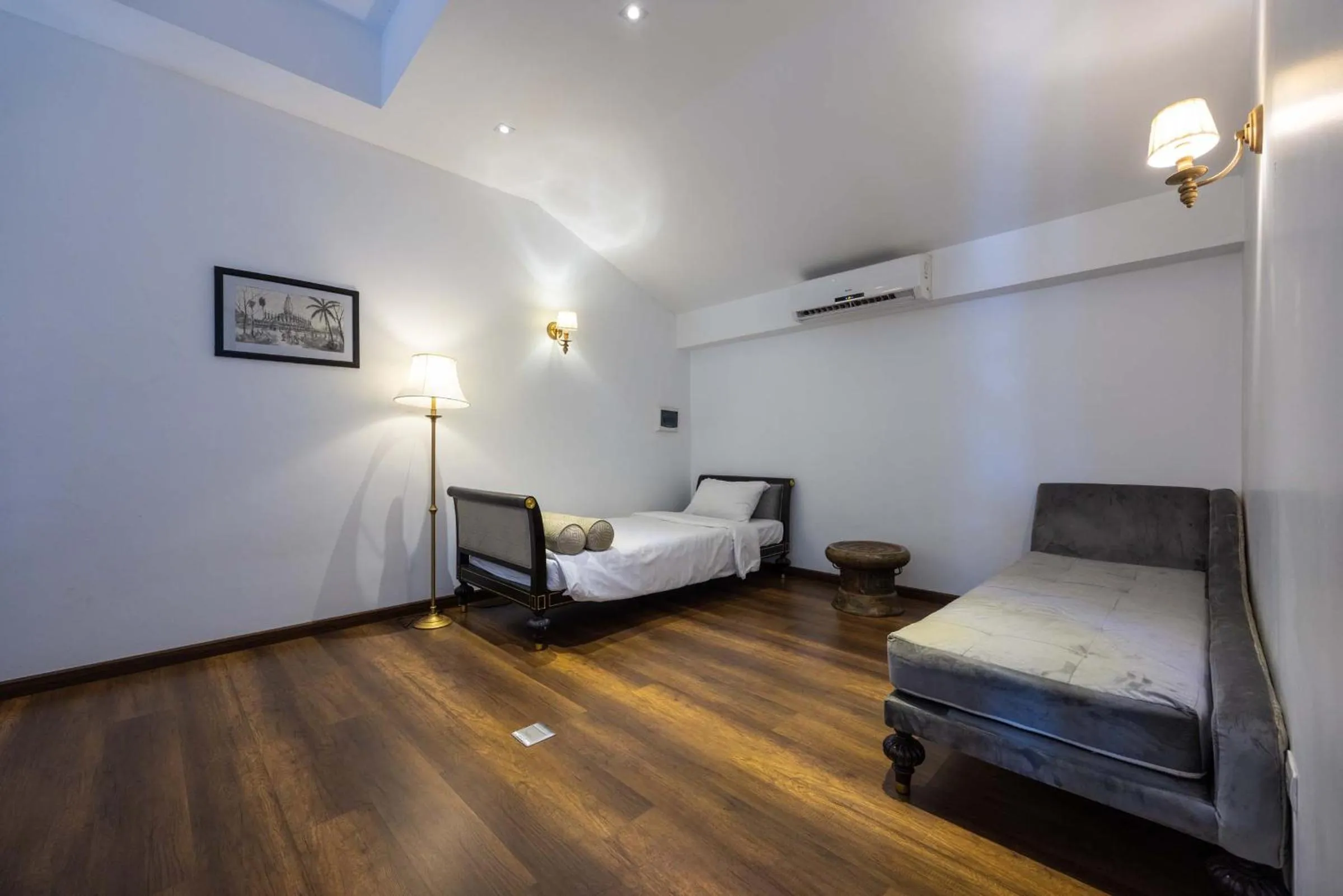 Seating area, Bed in Le Thatluang D'oR Boutique Hotel