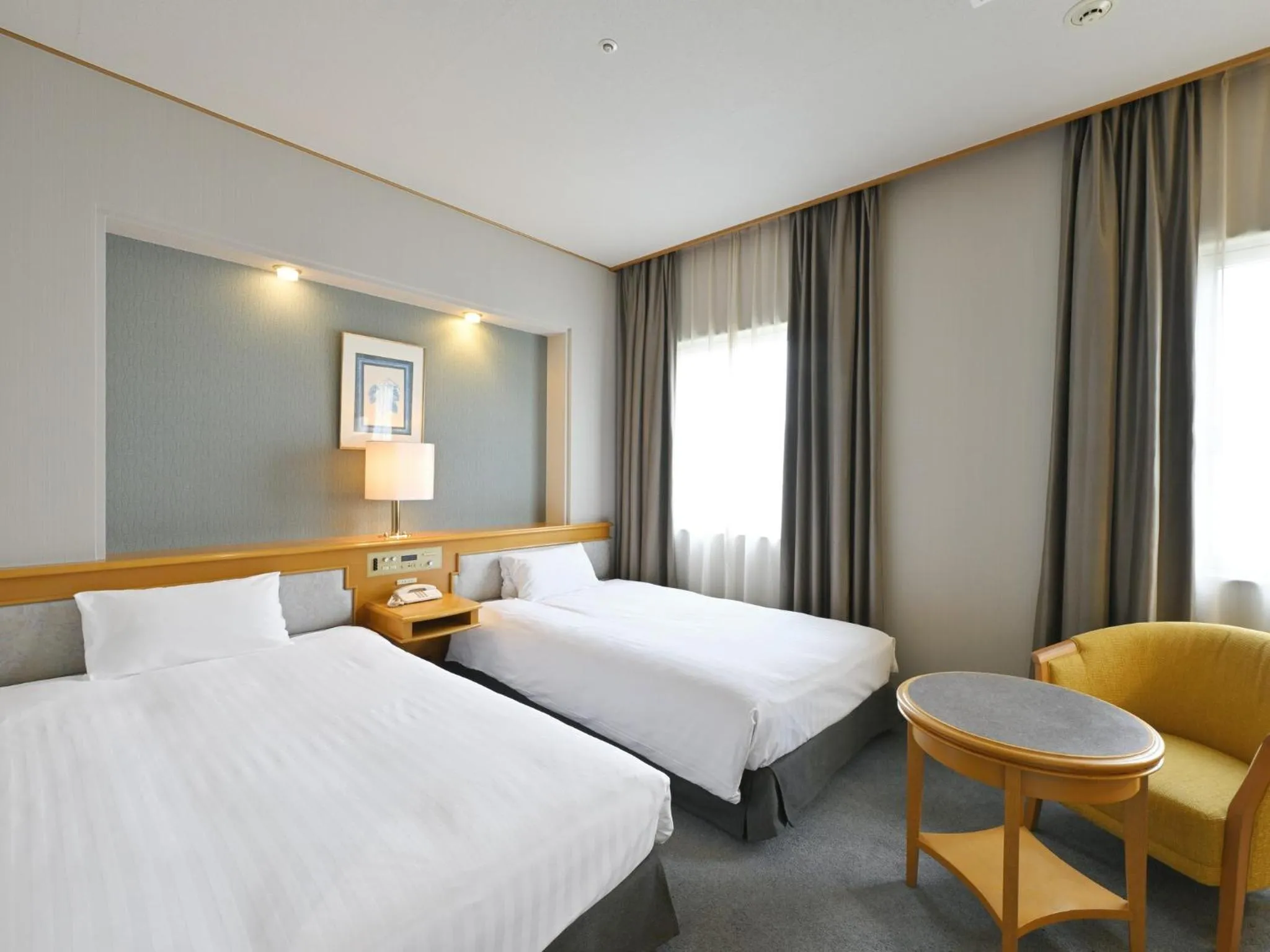 Bed in Rihga Hotel Zest Takamatsu