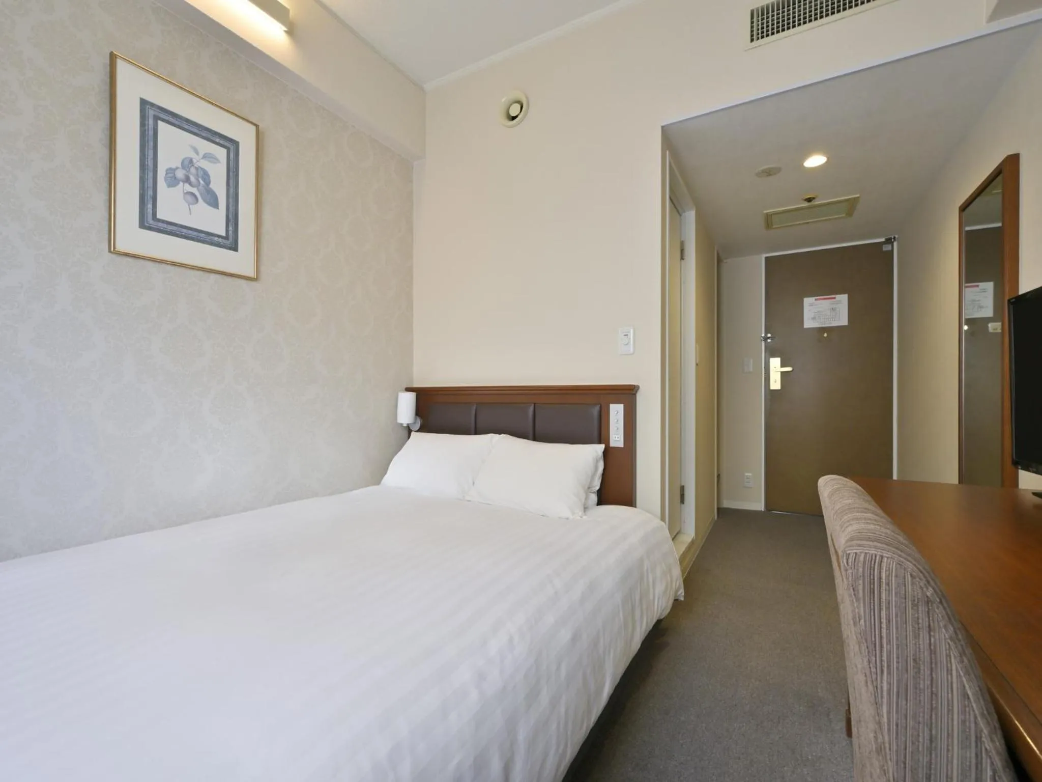 Bed in Rihga Hotel Zest Takamatsu