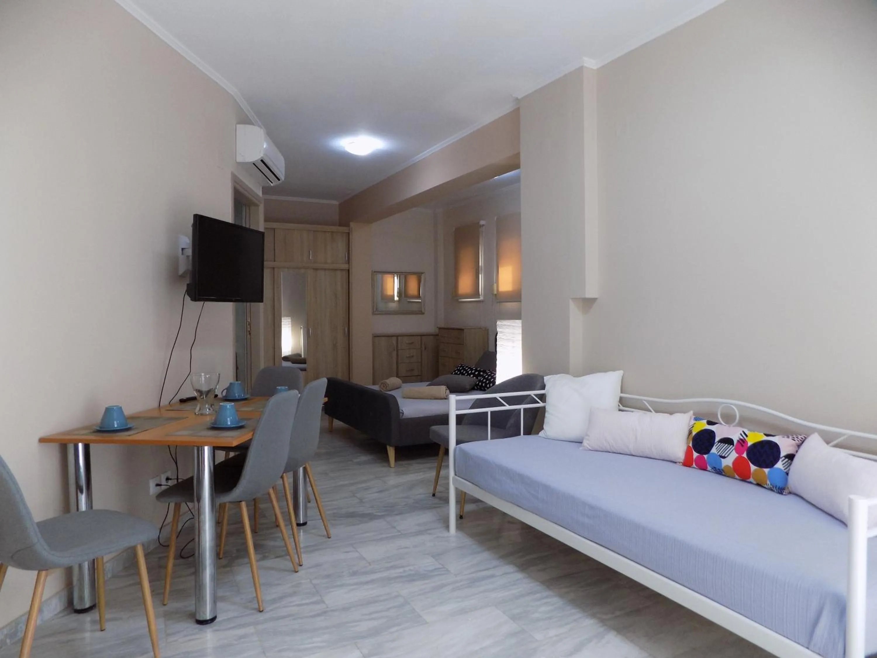 Seating area, Bed in Mastiha Villas in Town