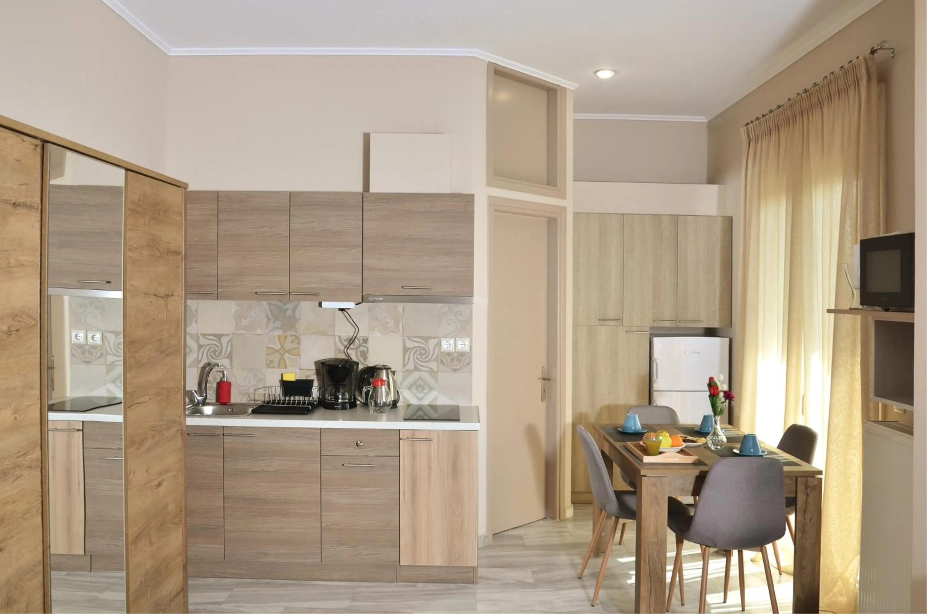 Kitchen or kitchenette in Mastiha Villas in Town