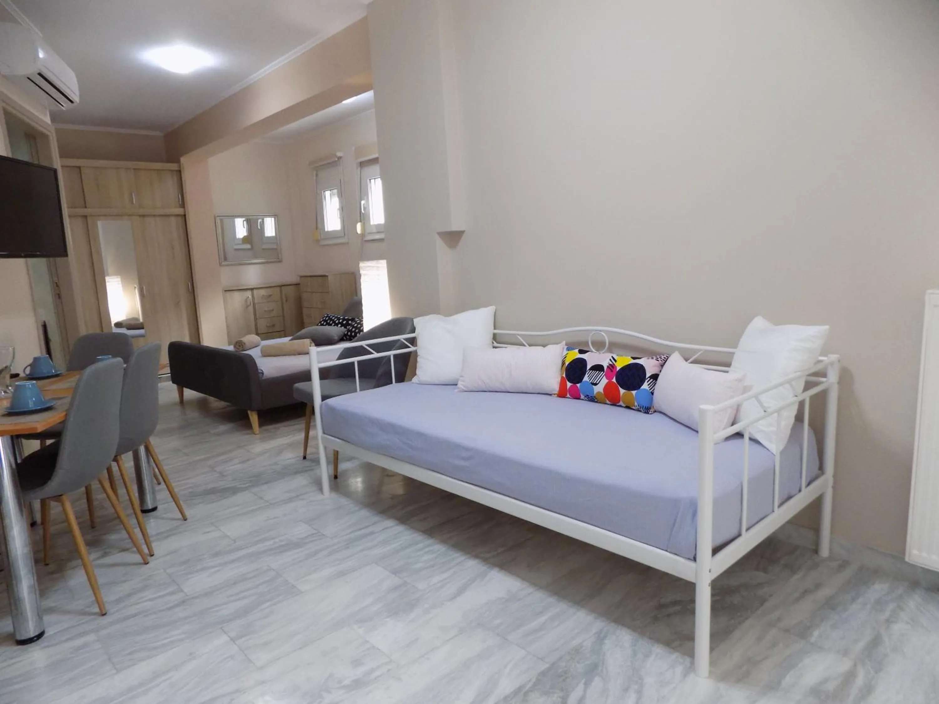 Seating area, Bed in Mastiha Villas in Town