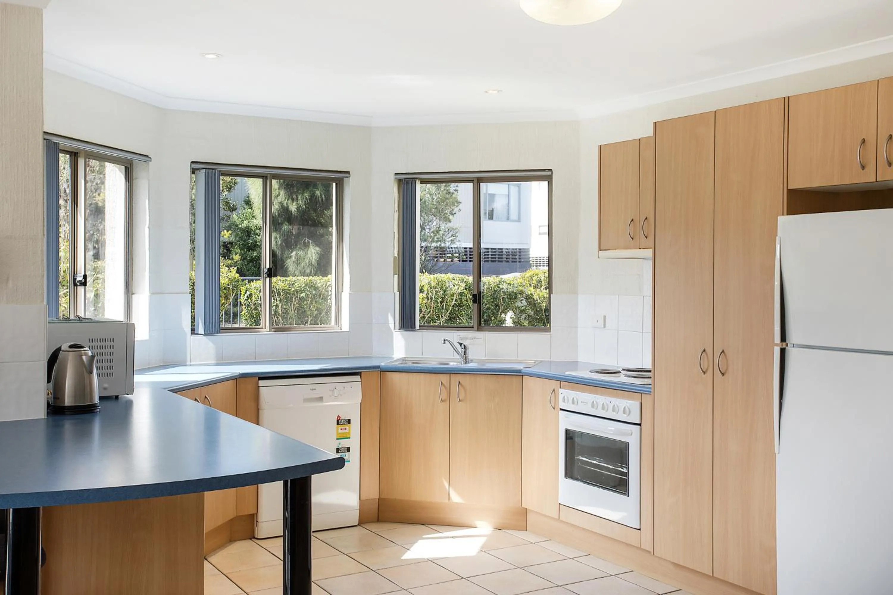 Kitchen or kitchenette in Sails Luxury Apartments Merimbula