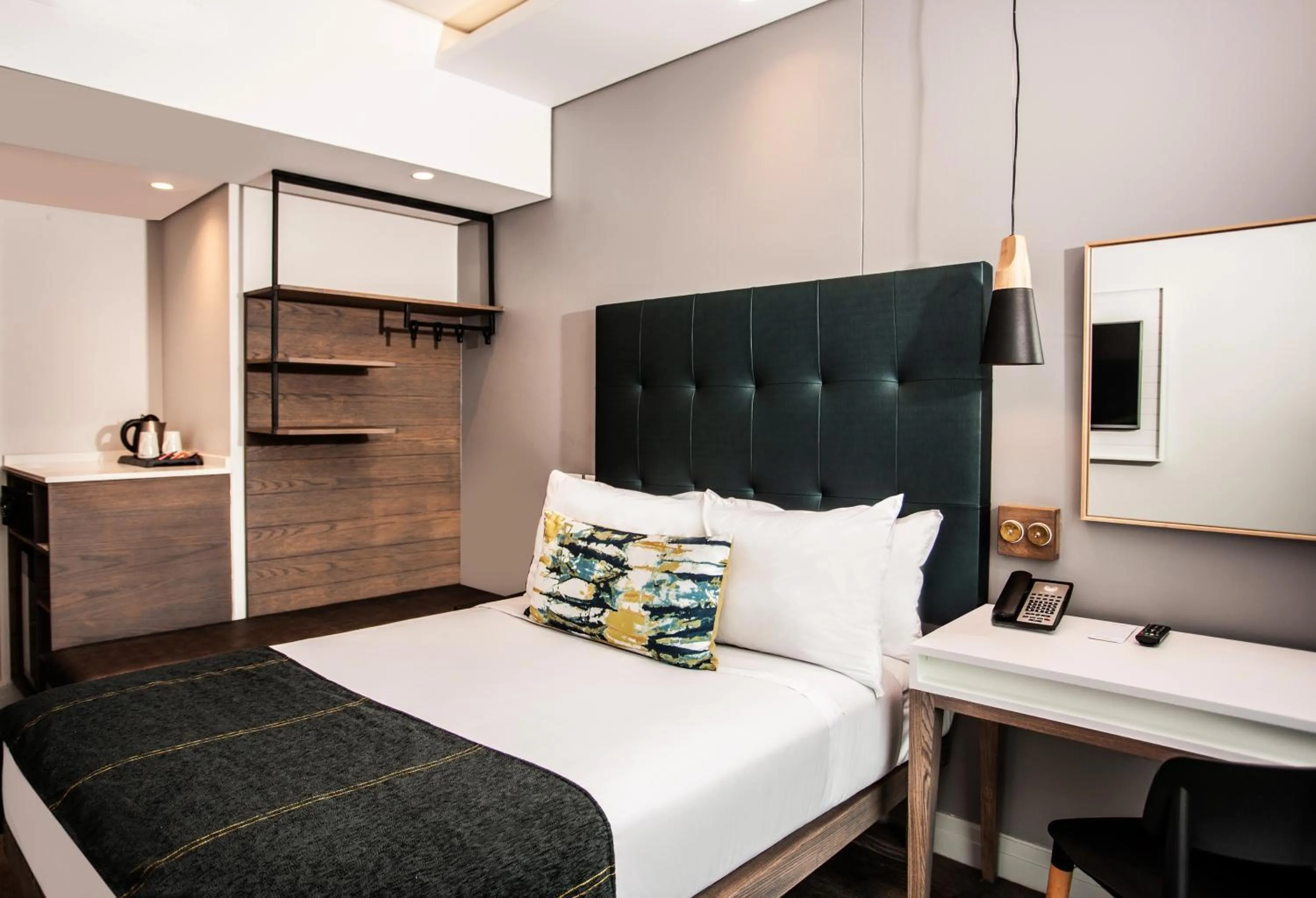 Bed in StayEasy Maputo