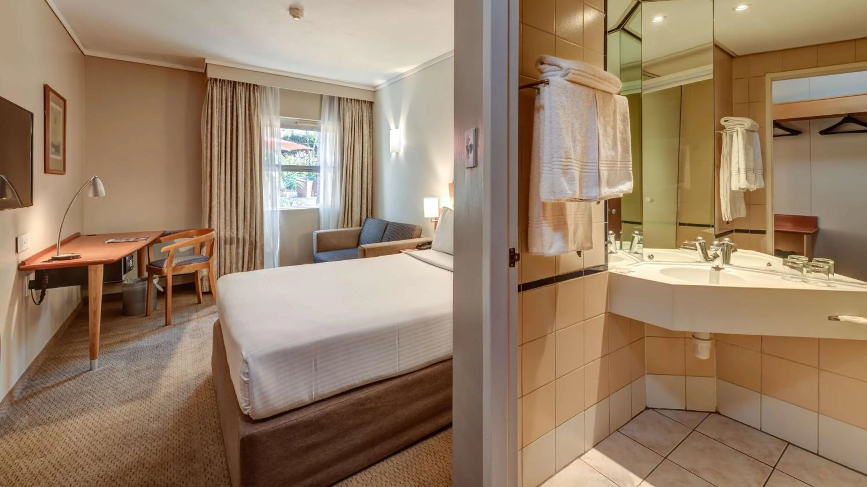 Bathroom, Bed in StayEasy Pretoria