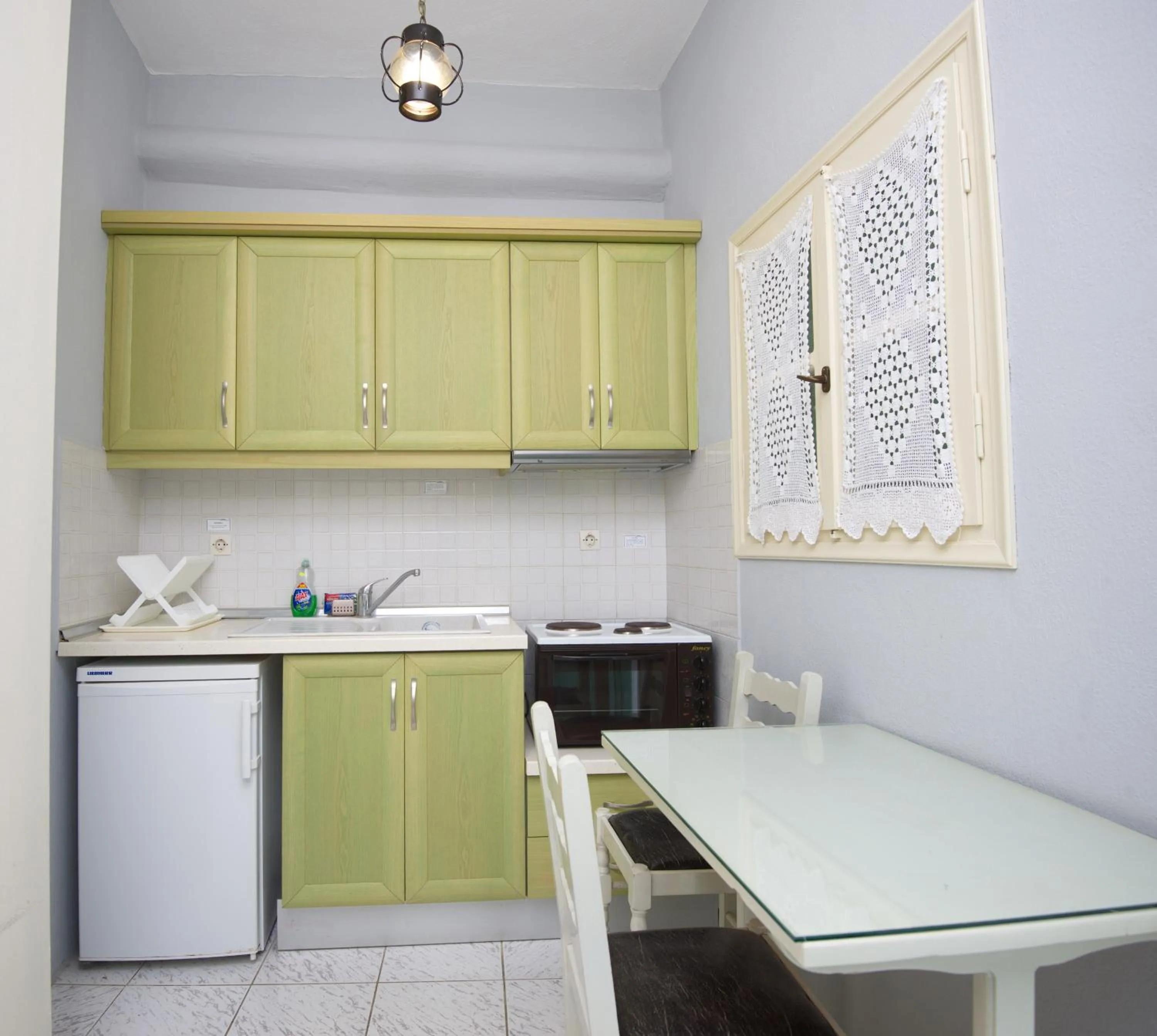 Kitchen or kitchenette in Pension Votsi