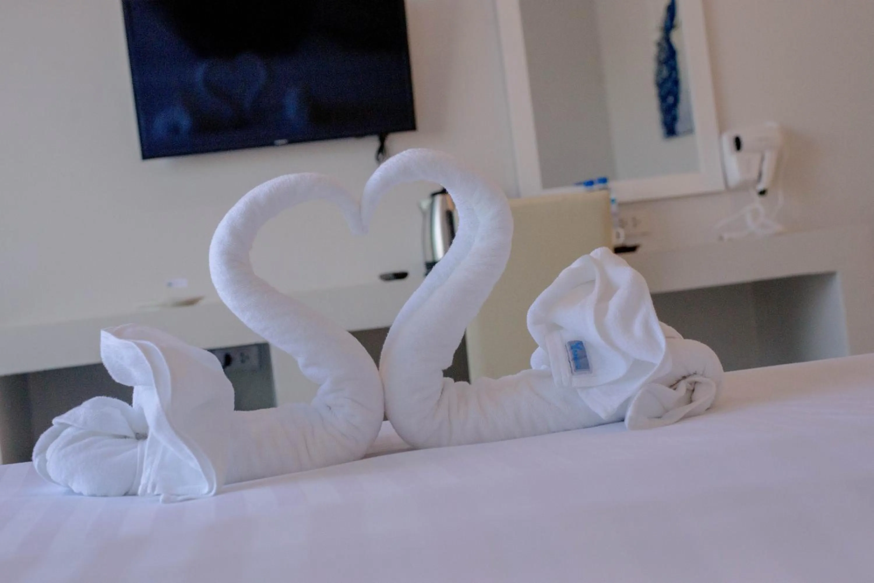 Bed in Baan Yamoo Ranong