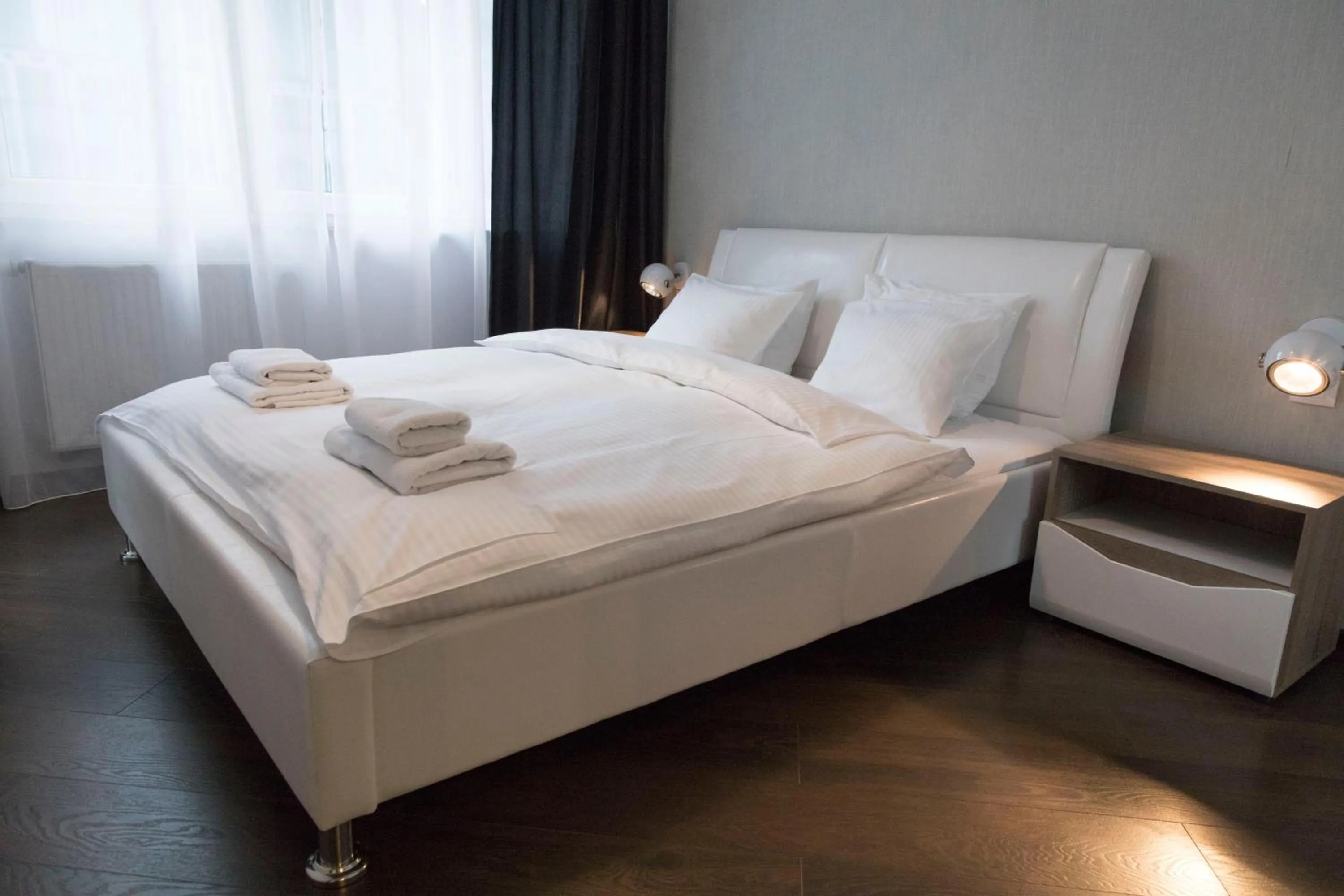 Bed in Apartament Moniuszki by Your Freedom