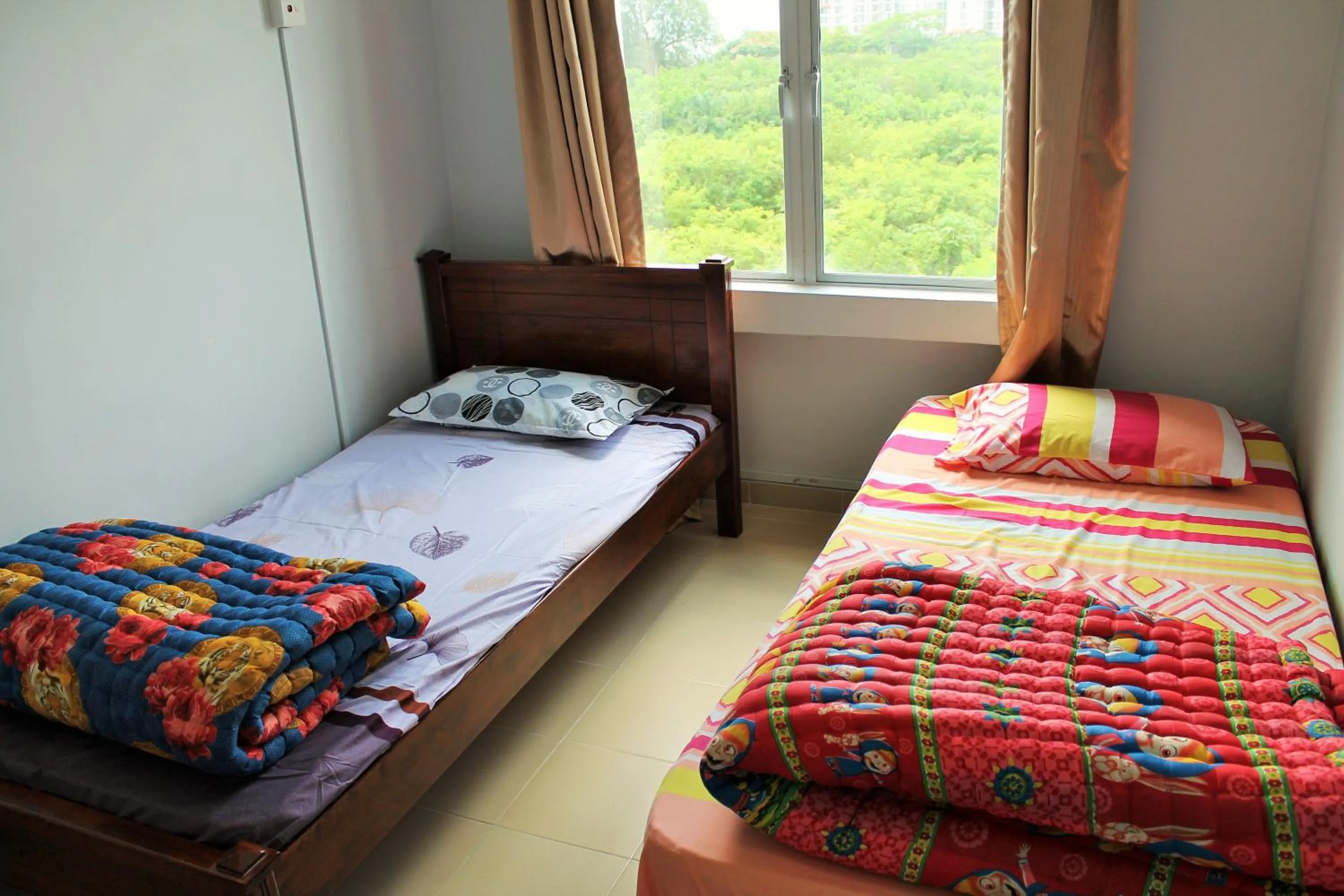 Garden view, Bed in Ocean View Resort