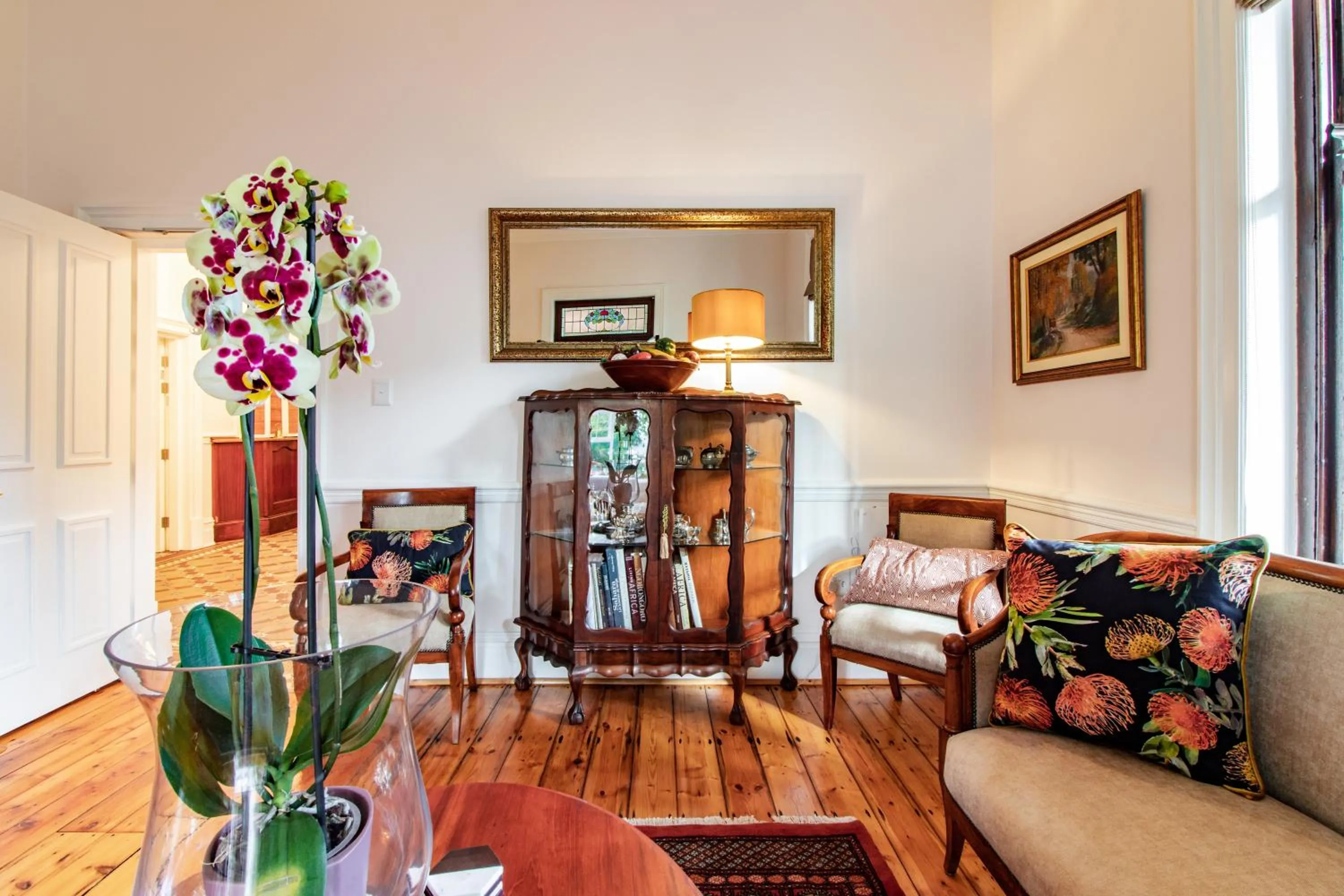 Communal lounge/ TV room in Carmichael House Boutique Hotel