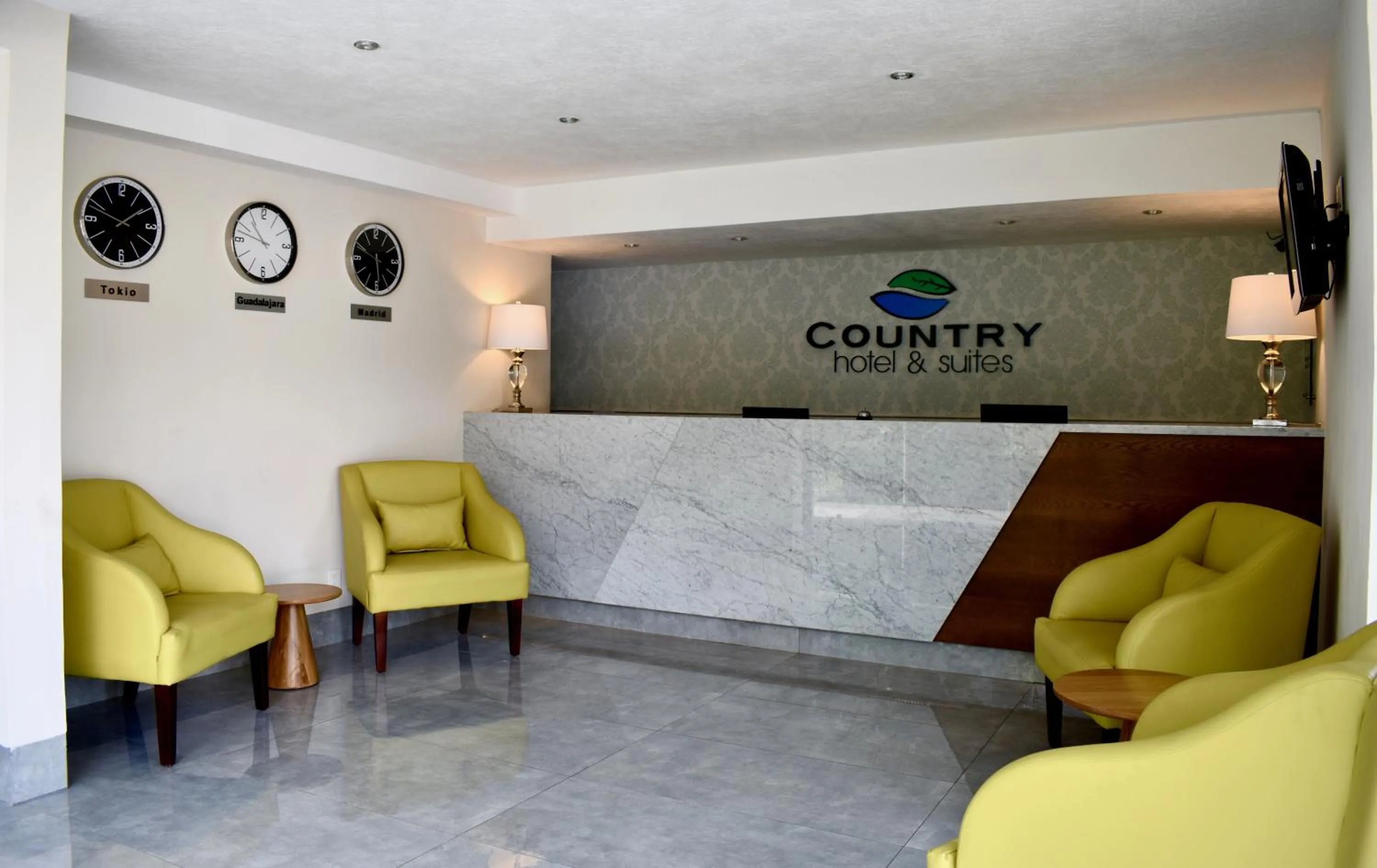 Lobby or reception in Country Hotel & Suites