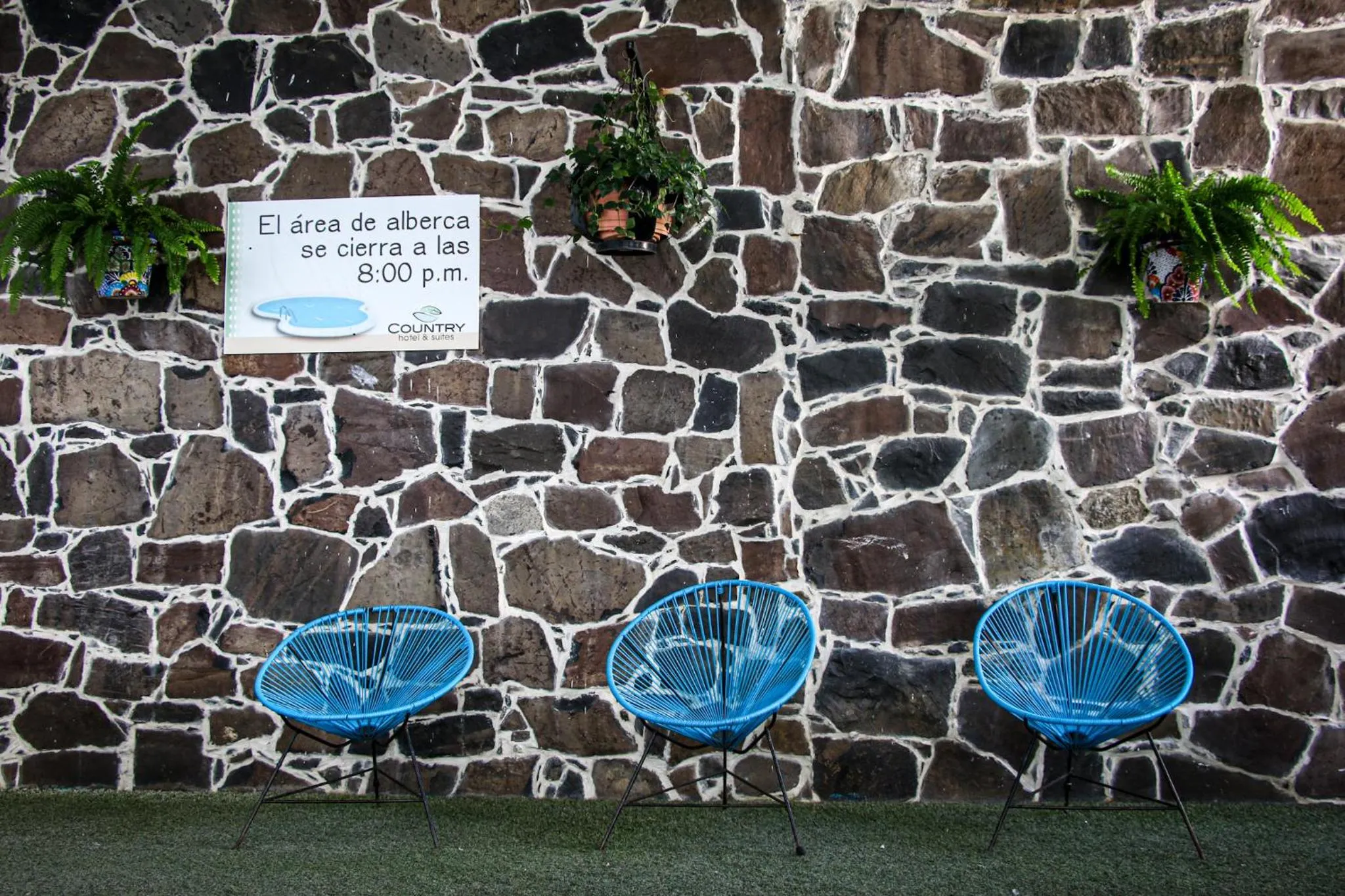 Property logo or sign in Country Hotel & Suites