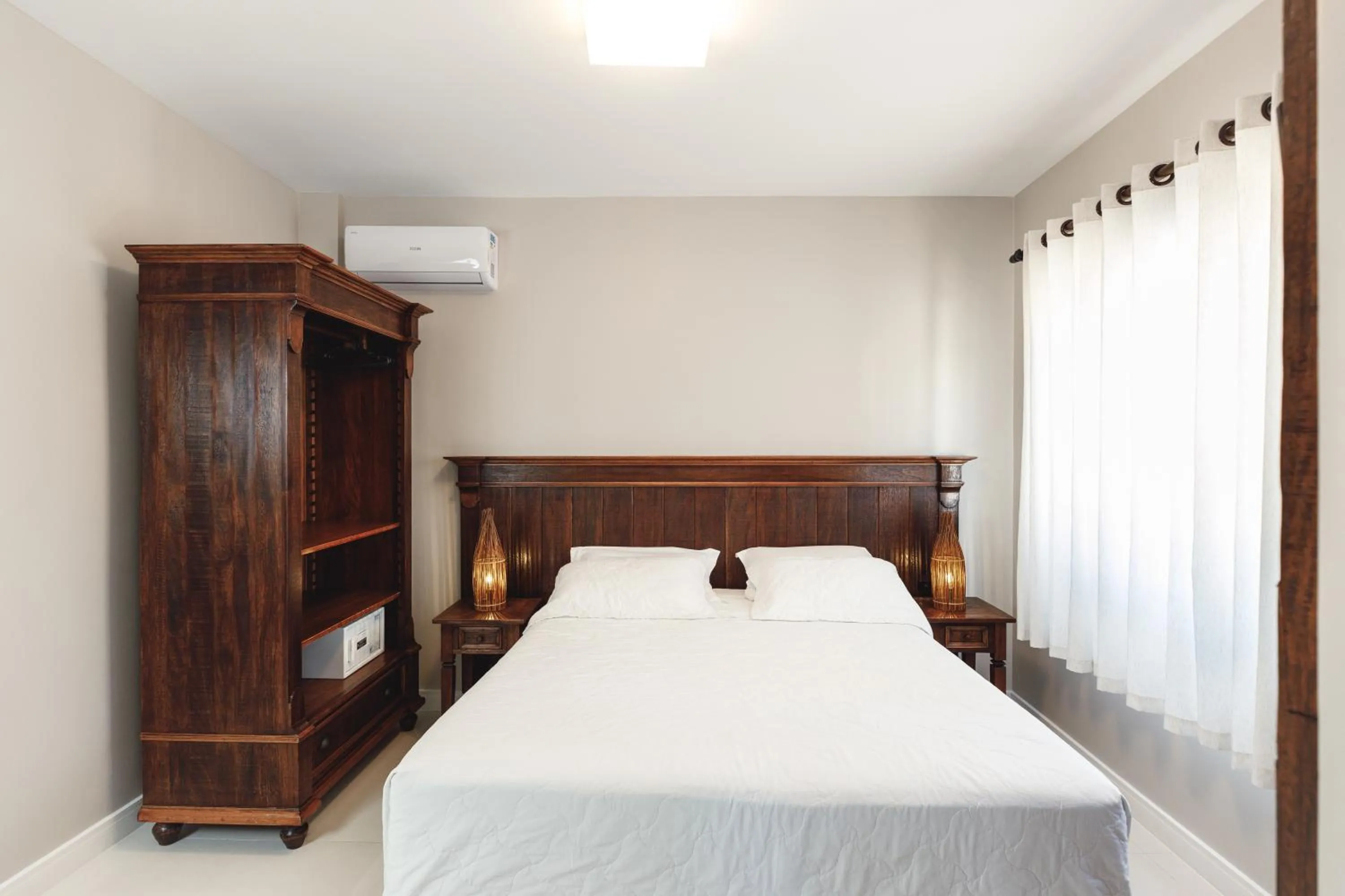 Bed in Pousada Bora Bora