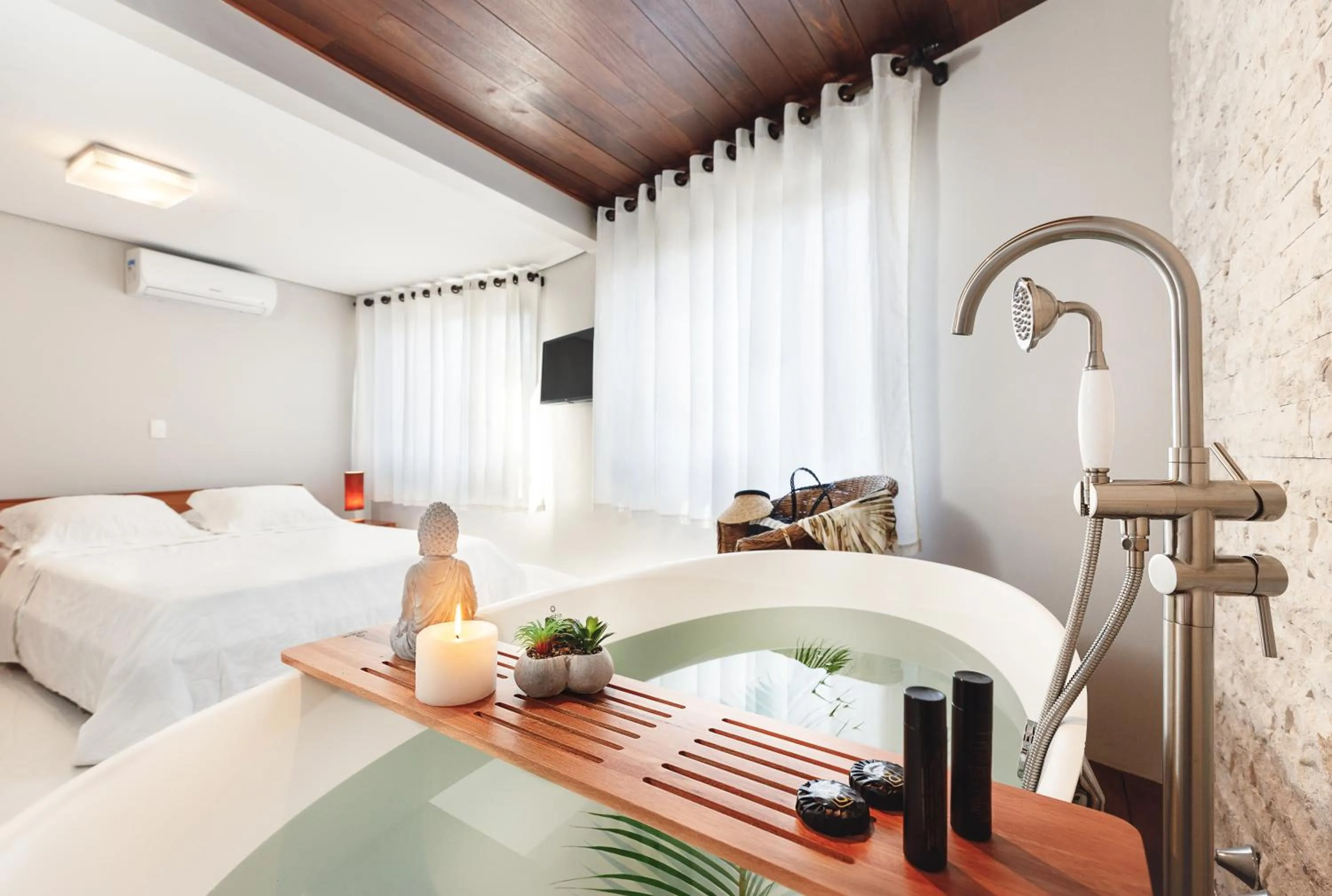 Bed in Pousada Bora Bora