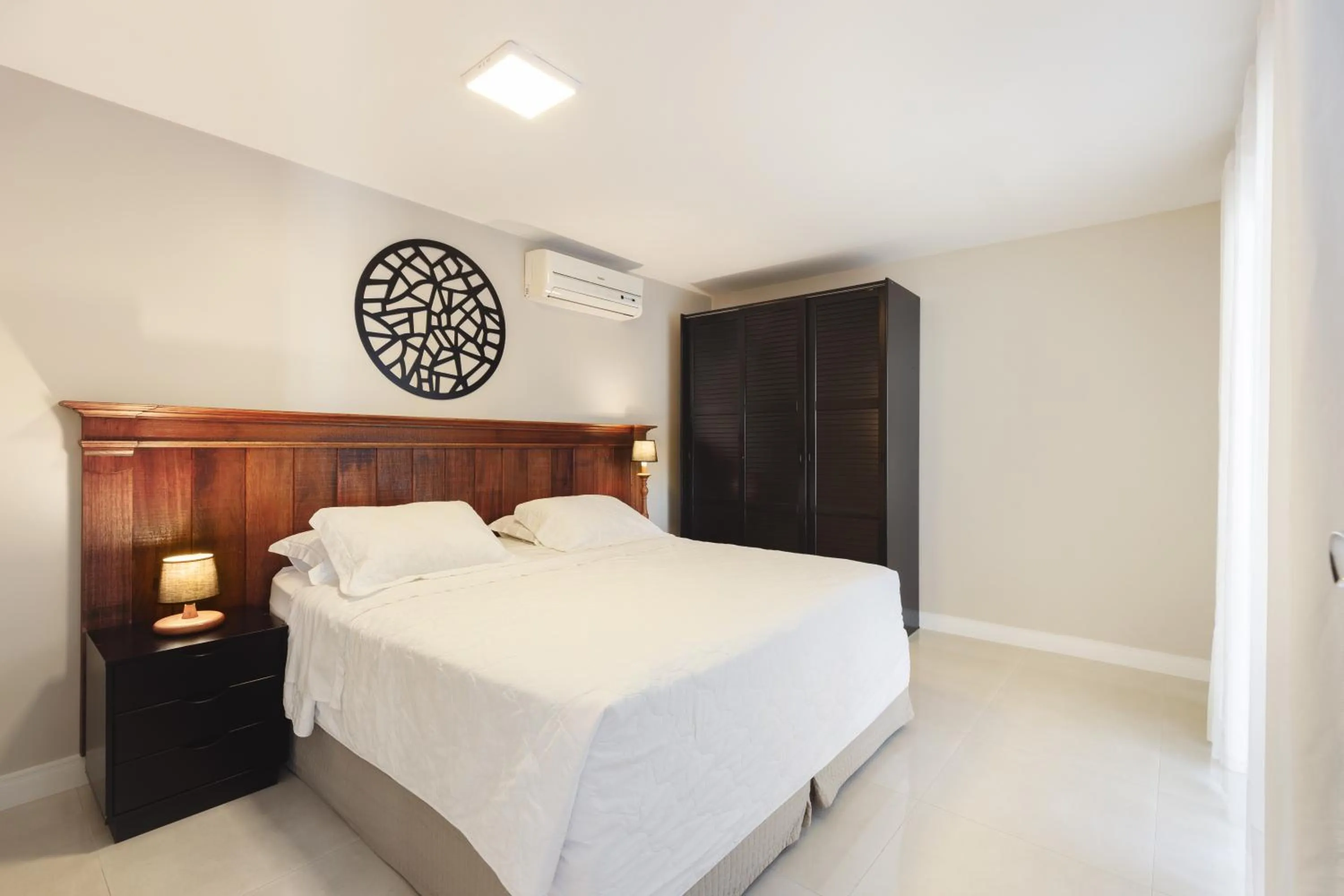 Bed in Pousada Bora Bora