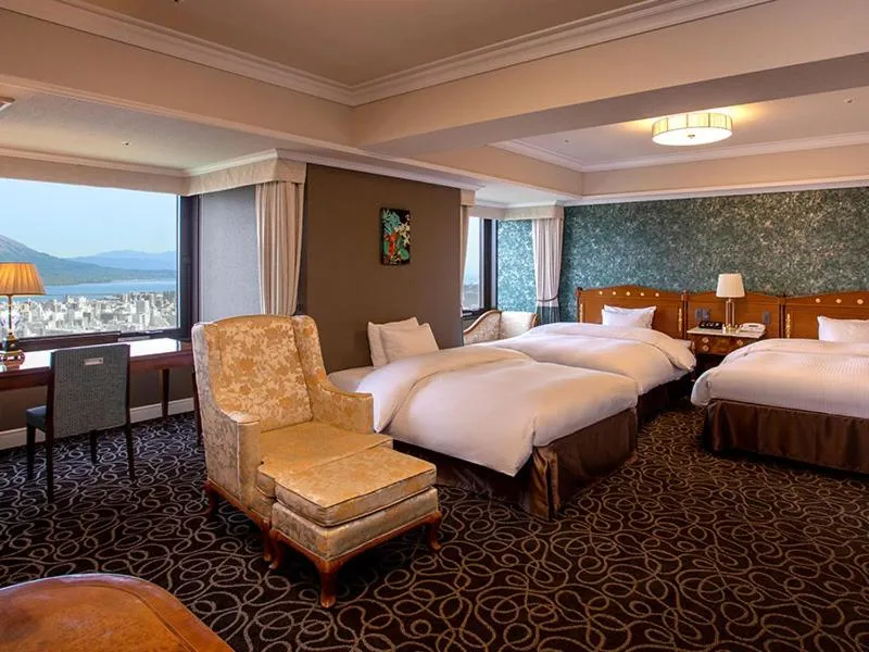 Bed in SHIROYAMA HOTEL kagoshima