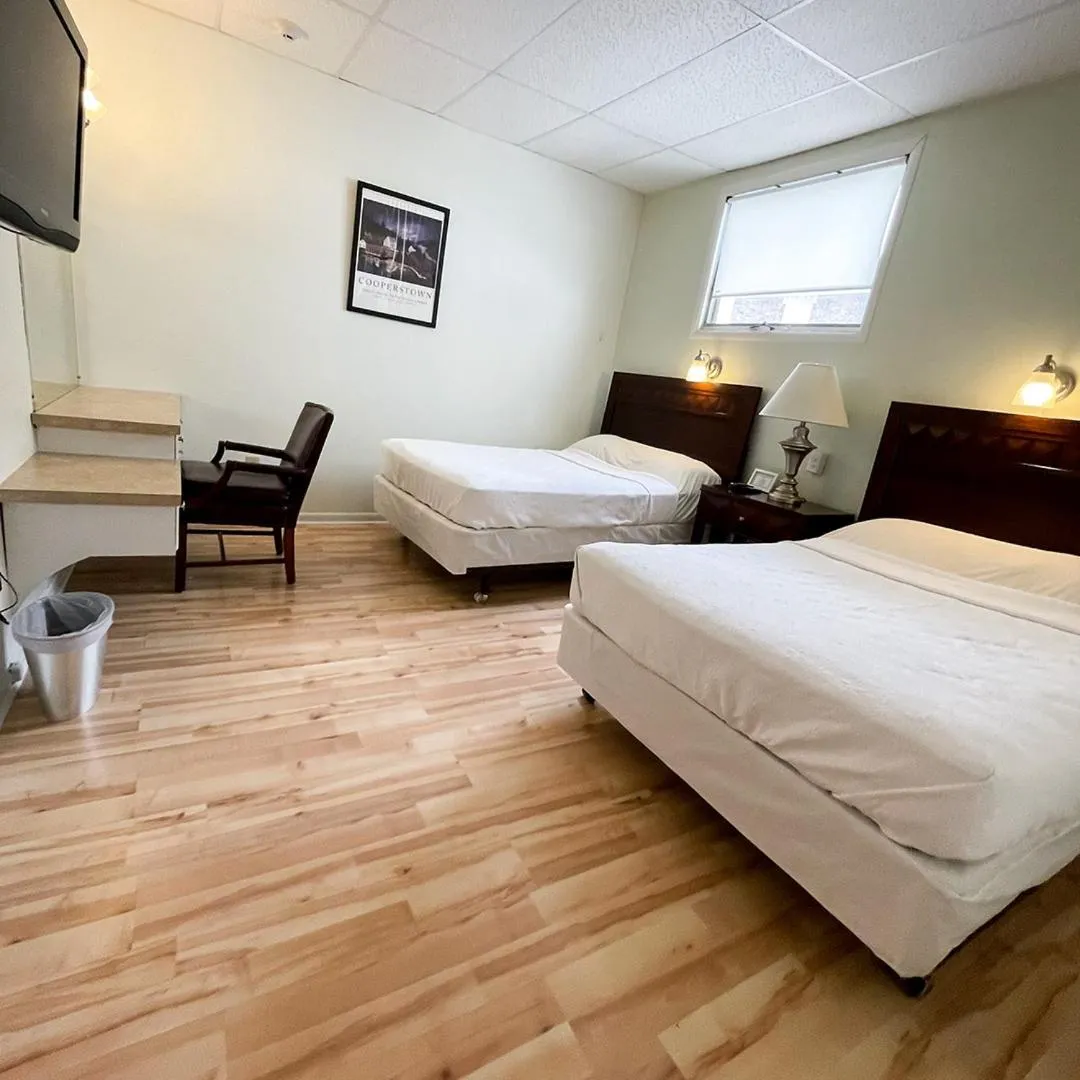 Bed in Baseball Town Motel