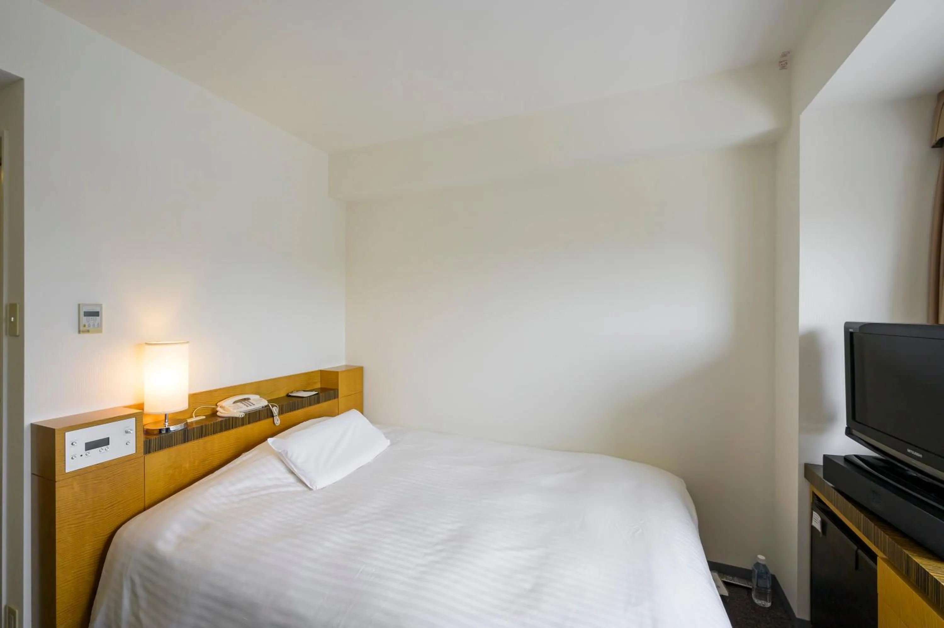 Bed in Twin Leaves Hotel Izumo