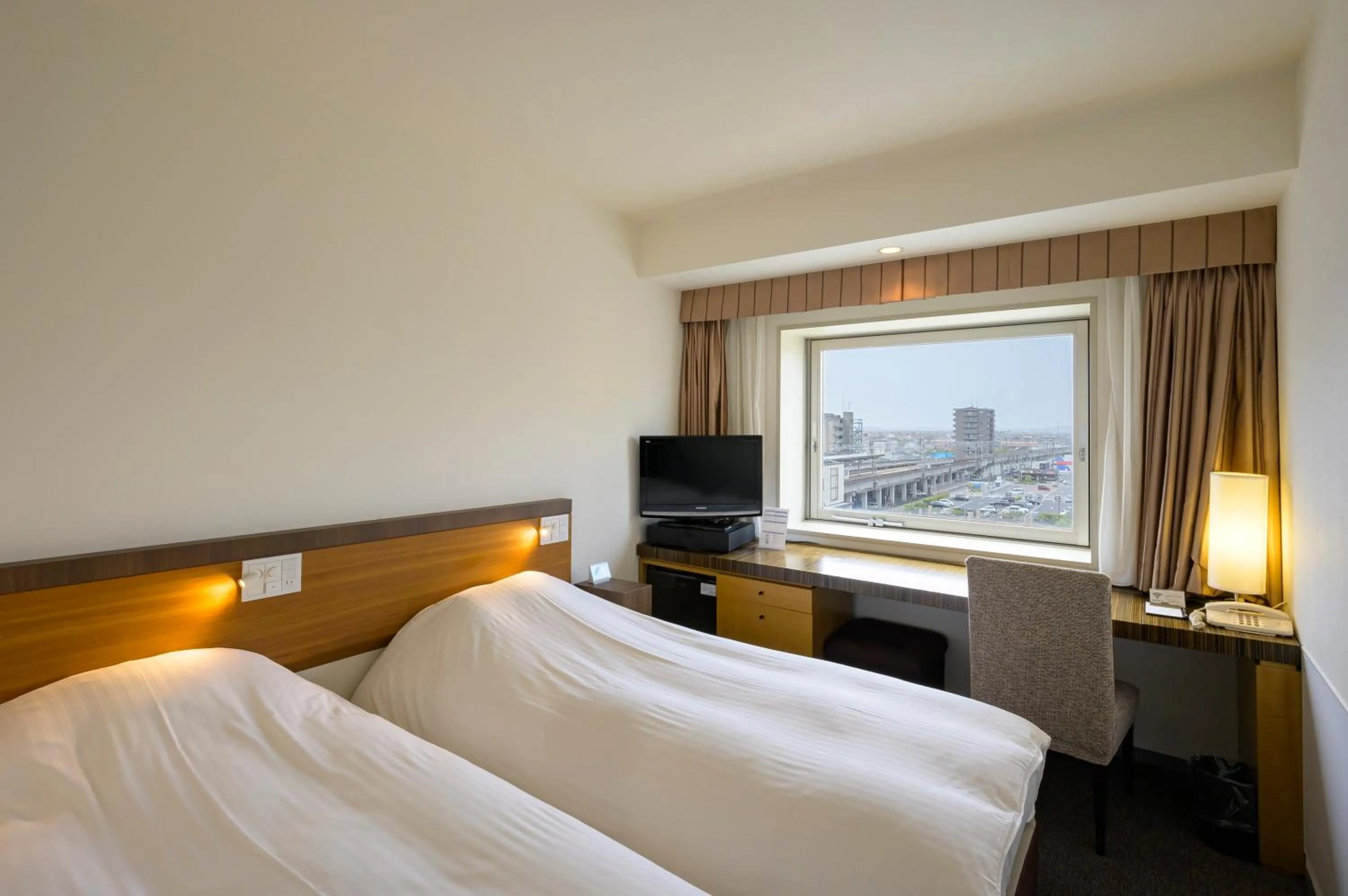 Bed in Twin Leaves Hotel Izumo