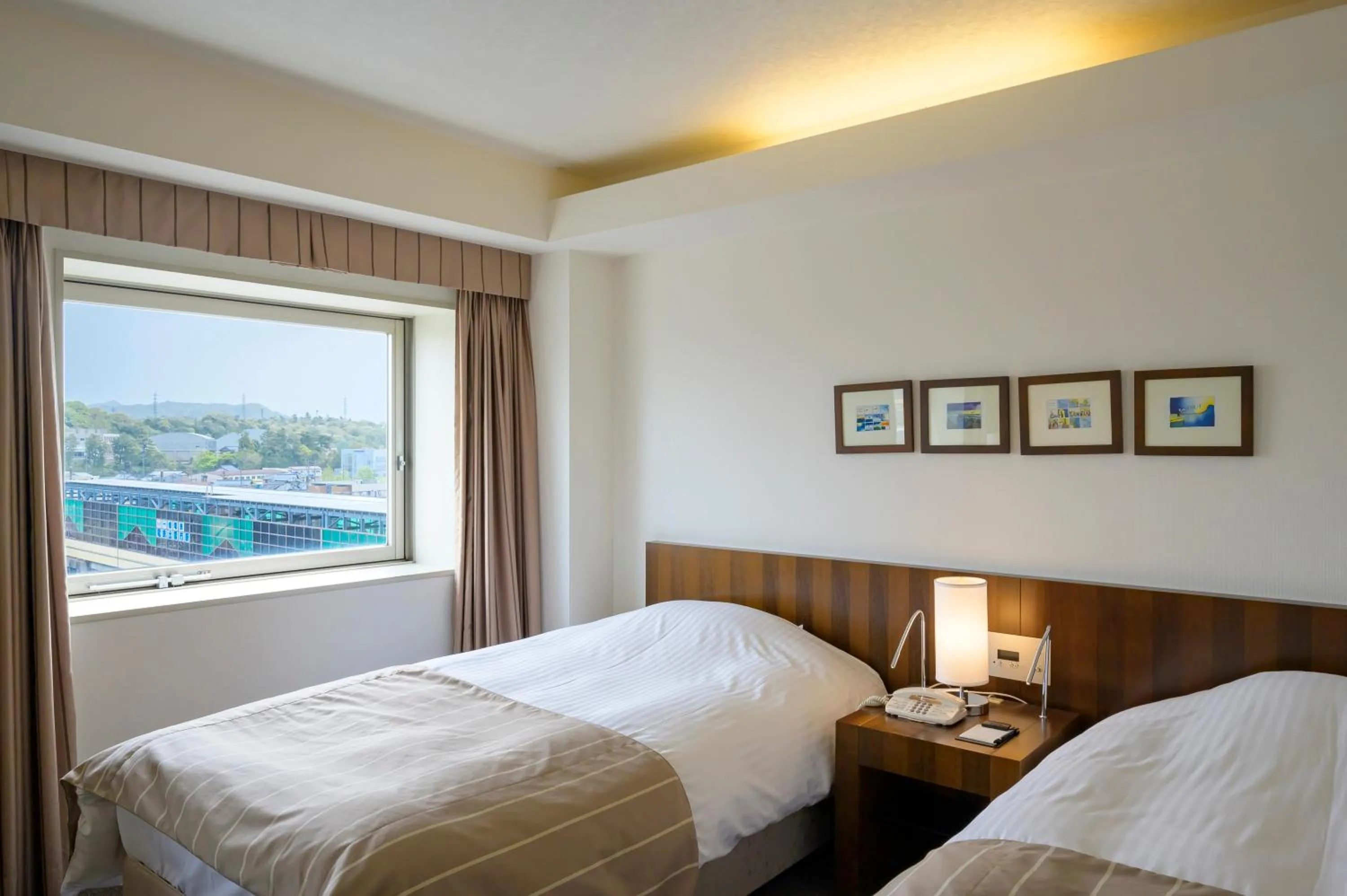 Bed in Twin Leaves Hotel Izumo