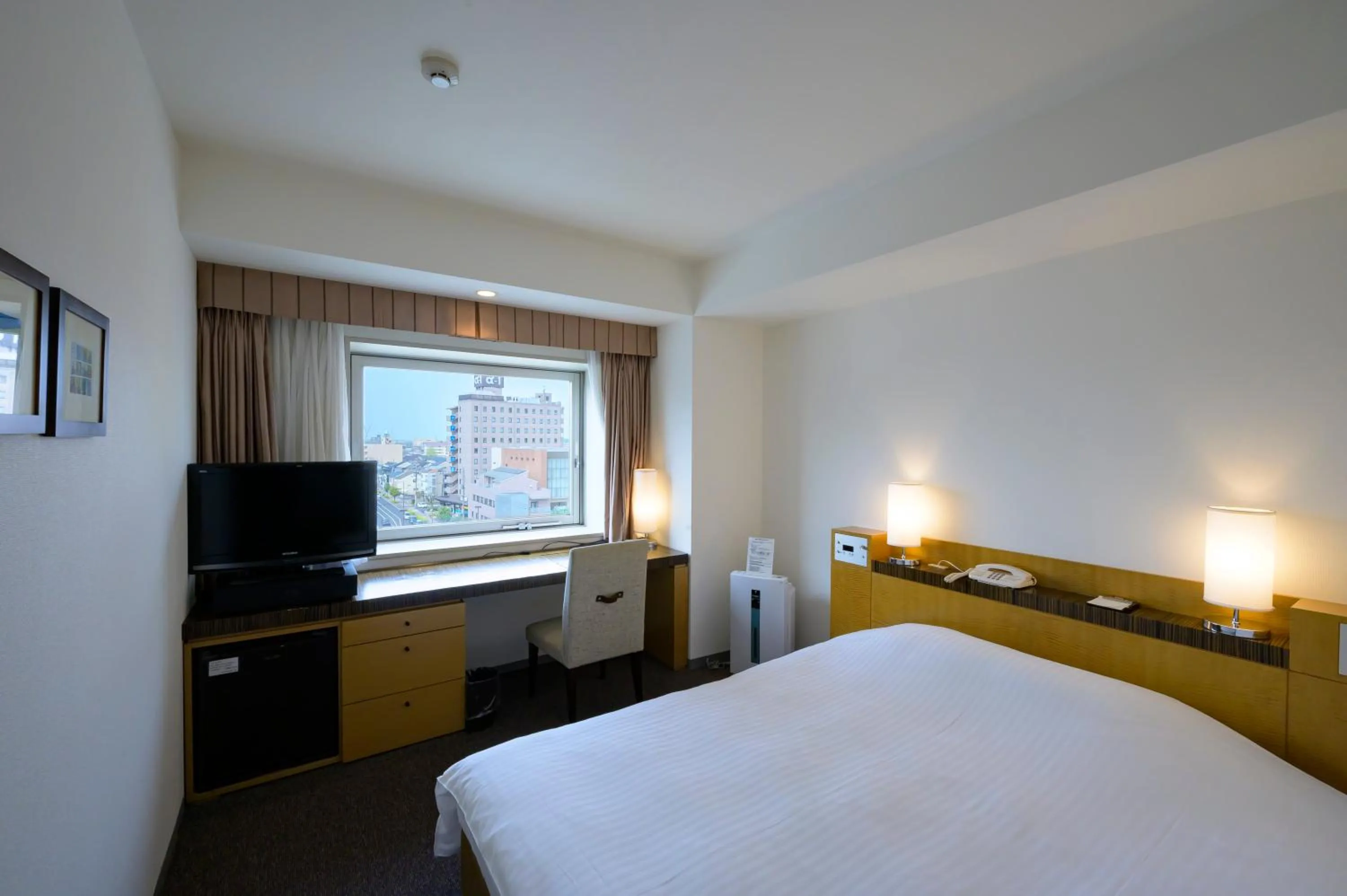 Bed in Twin Leaves Hotel Izumo